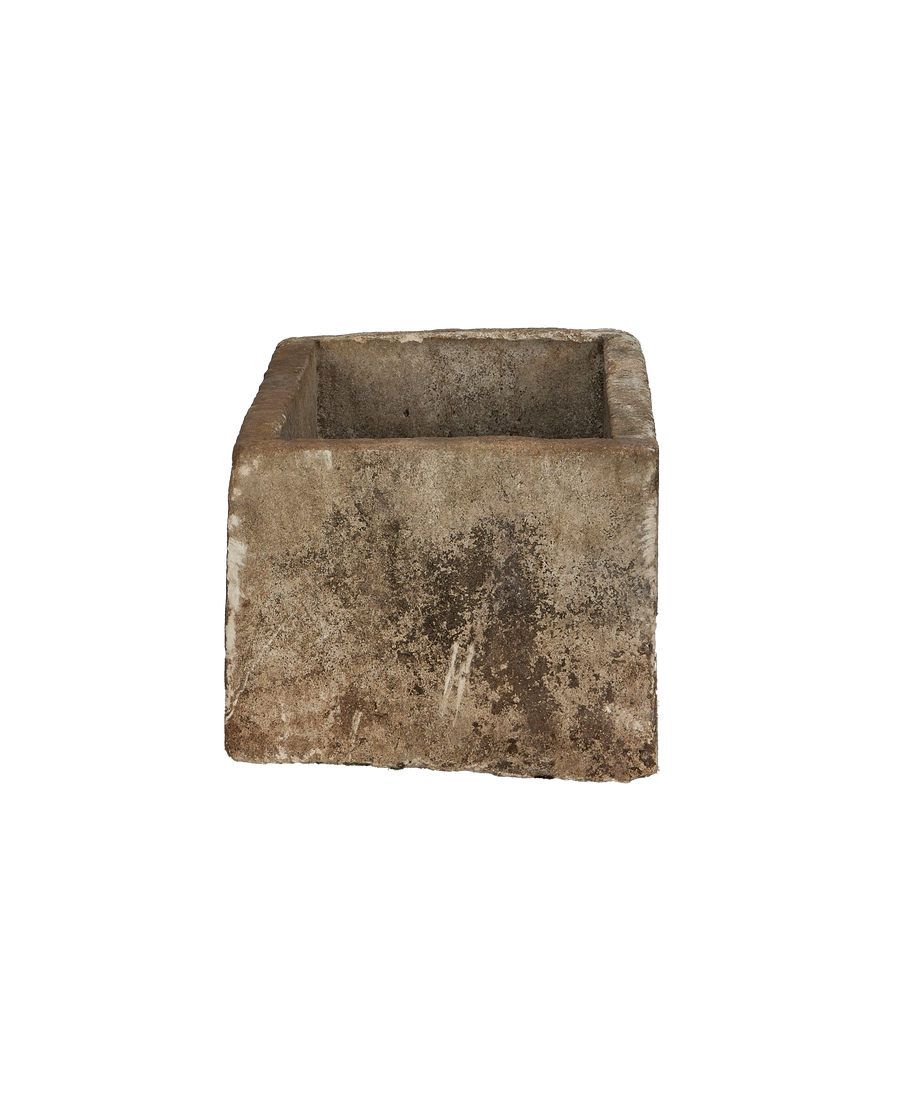 Vintage Indonesian limestone trough, displaying a textured exterior and weathered condition from an elevated angle.