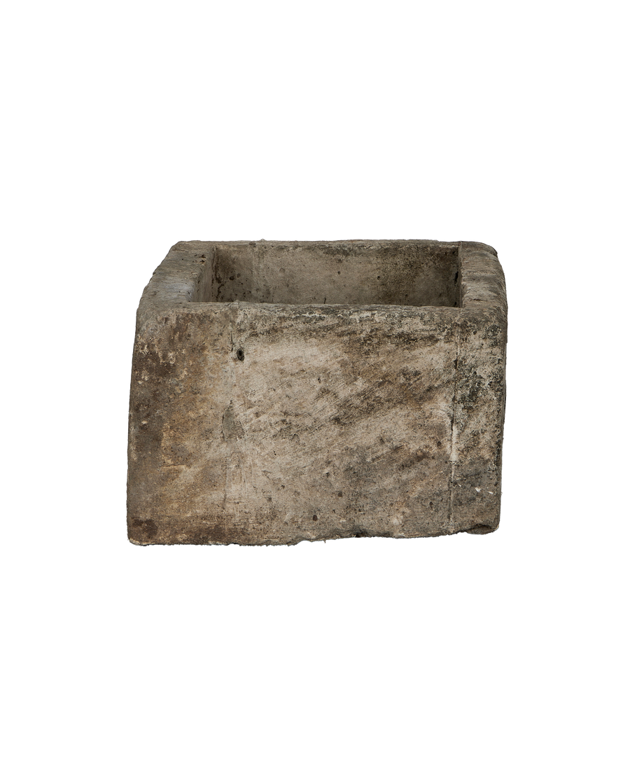 Vintage Indonesian limestone trough, rectangular, showcasing its weathered, OAK-colored texture and worn surface details.