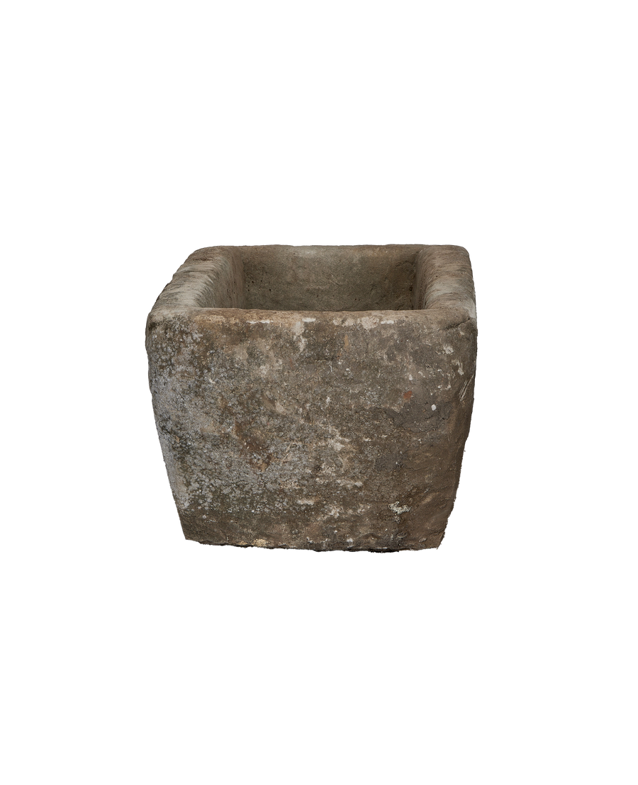 Vintage Indonesian limestone trough, showing unique weathered rough texture and patination.