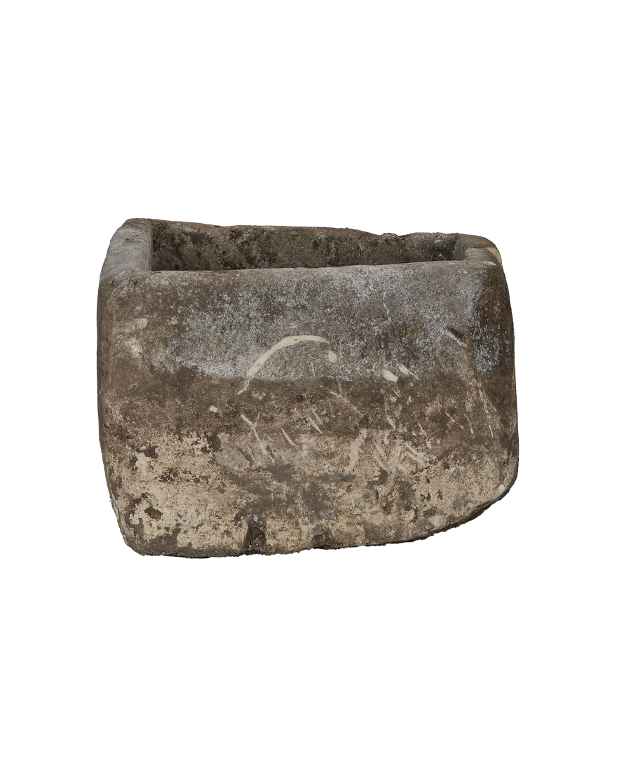 Vintage Indonesian limestone trough, rectangular, rustic gray texture with natural markings, angled view.