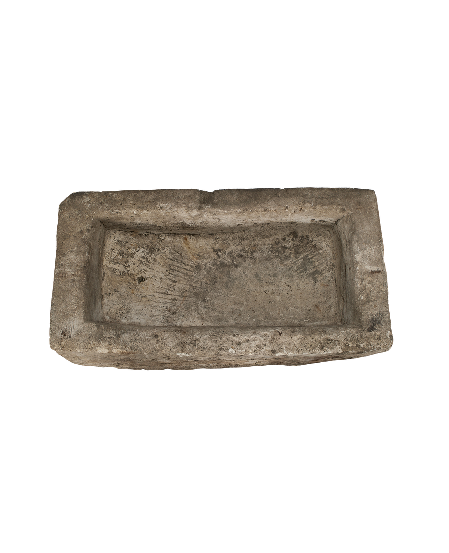 Vintage Indonesian limestone trough, top view shows weathered grey texture and rectangular basin.