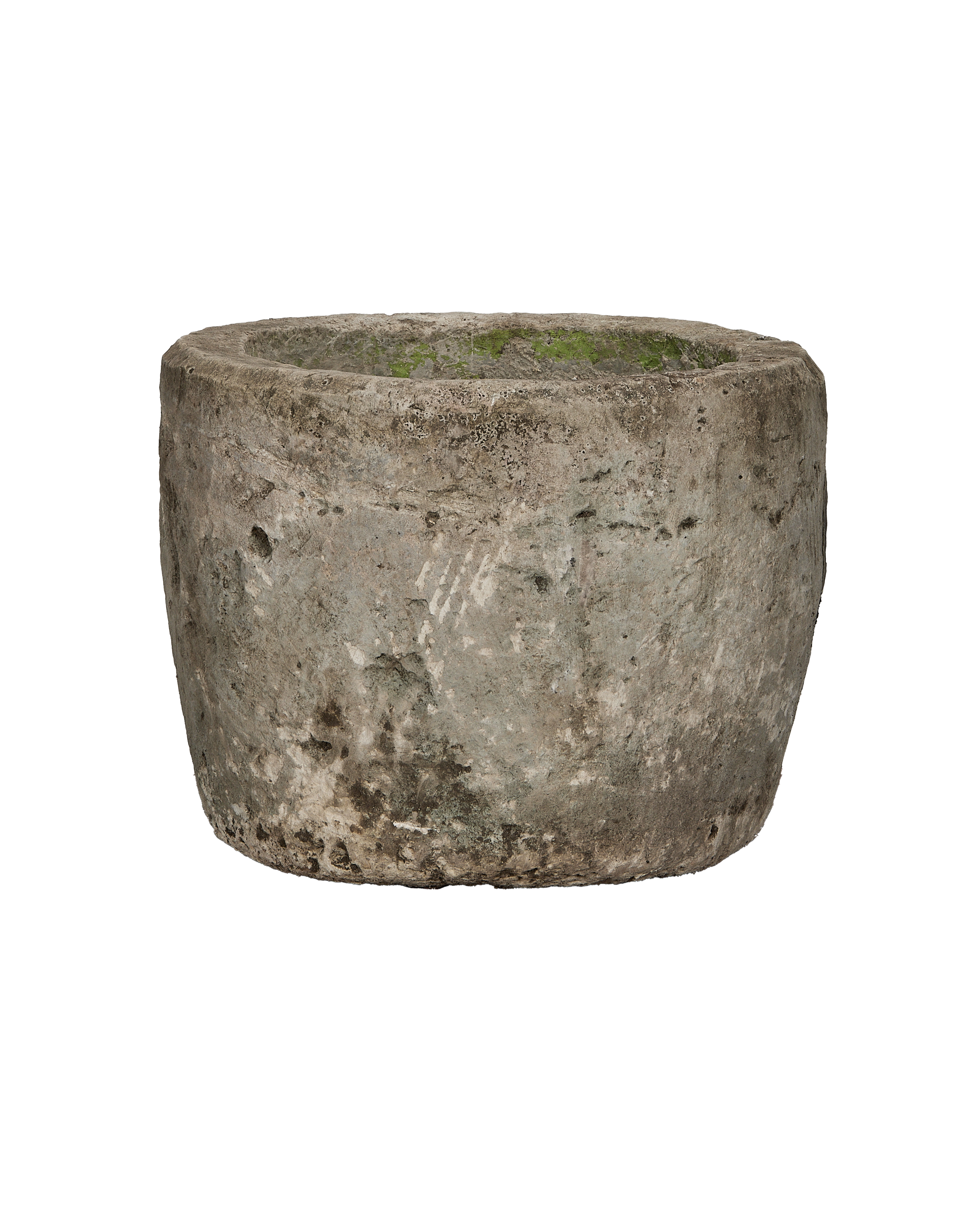 Vintage Indonesian round limestone trough, showing weathered texture, mossy interior, and exterior surface detail.