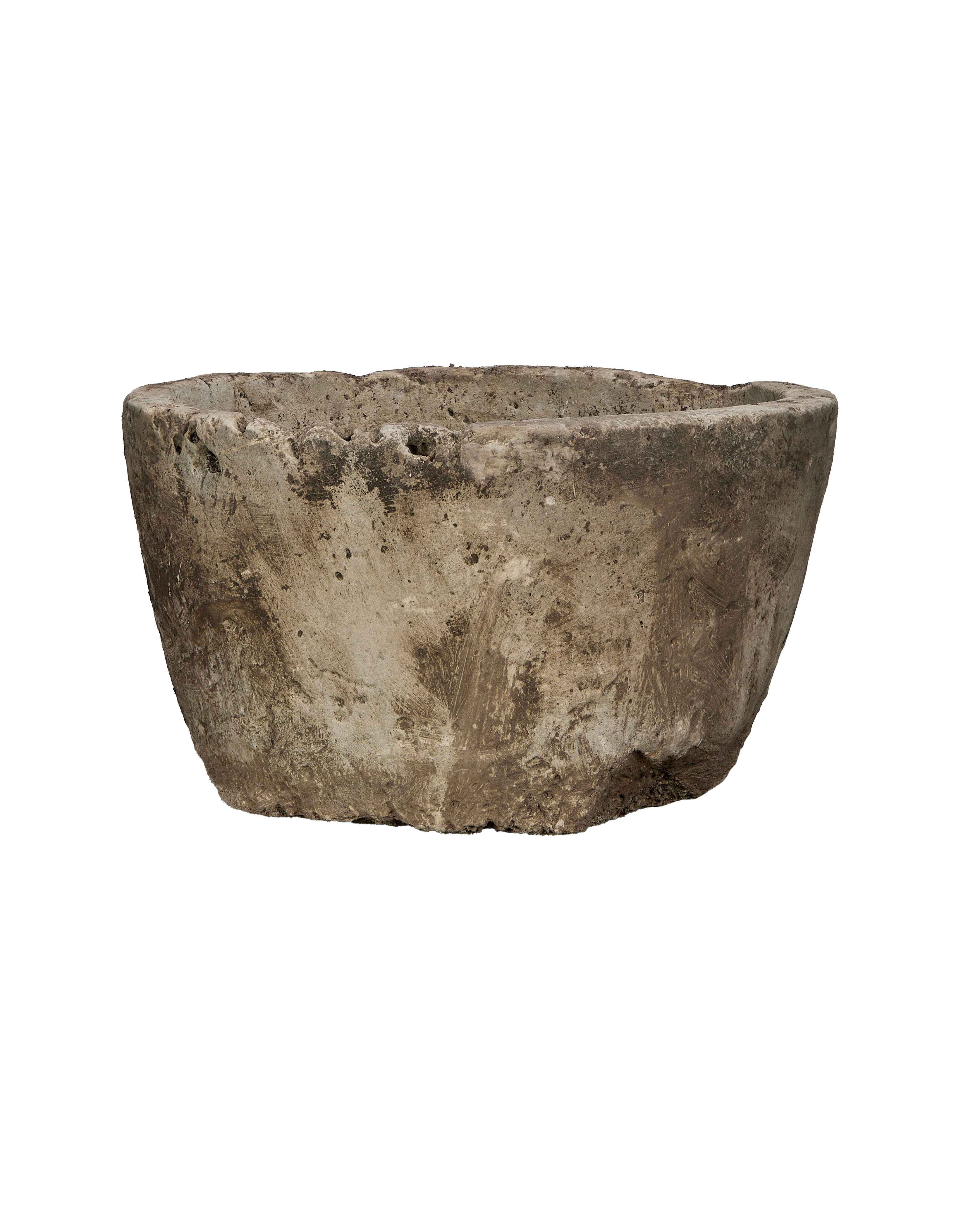Vintage Indonesian round limestone trough, naturally weathered with textured grey and brown surface.