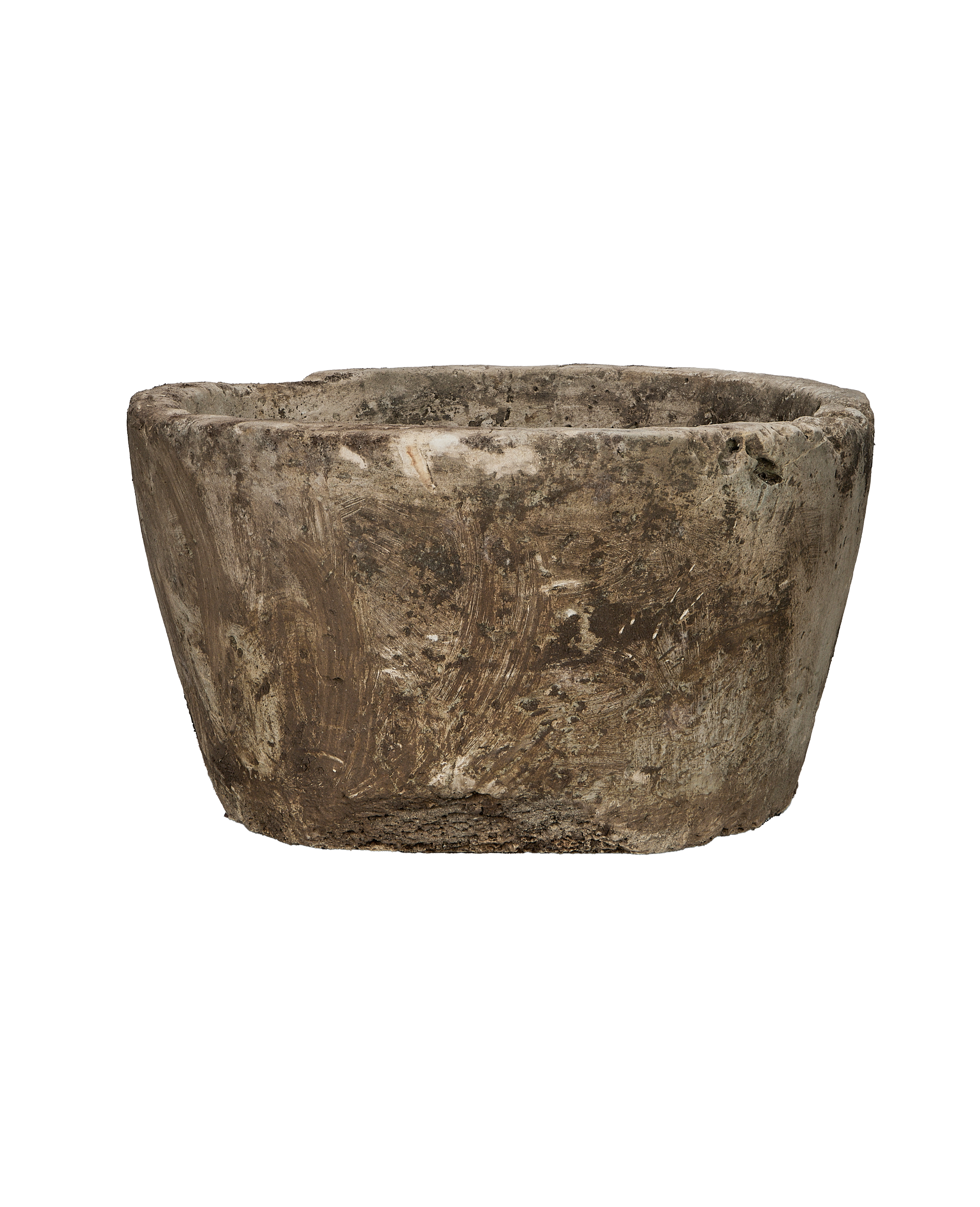 Vintage Indonesian round limestone trough, showcasing textured exterior and distressed surface from a side angle.