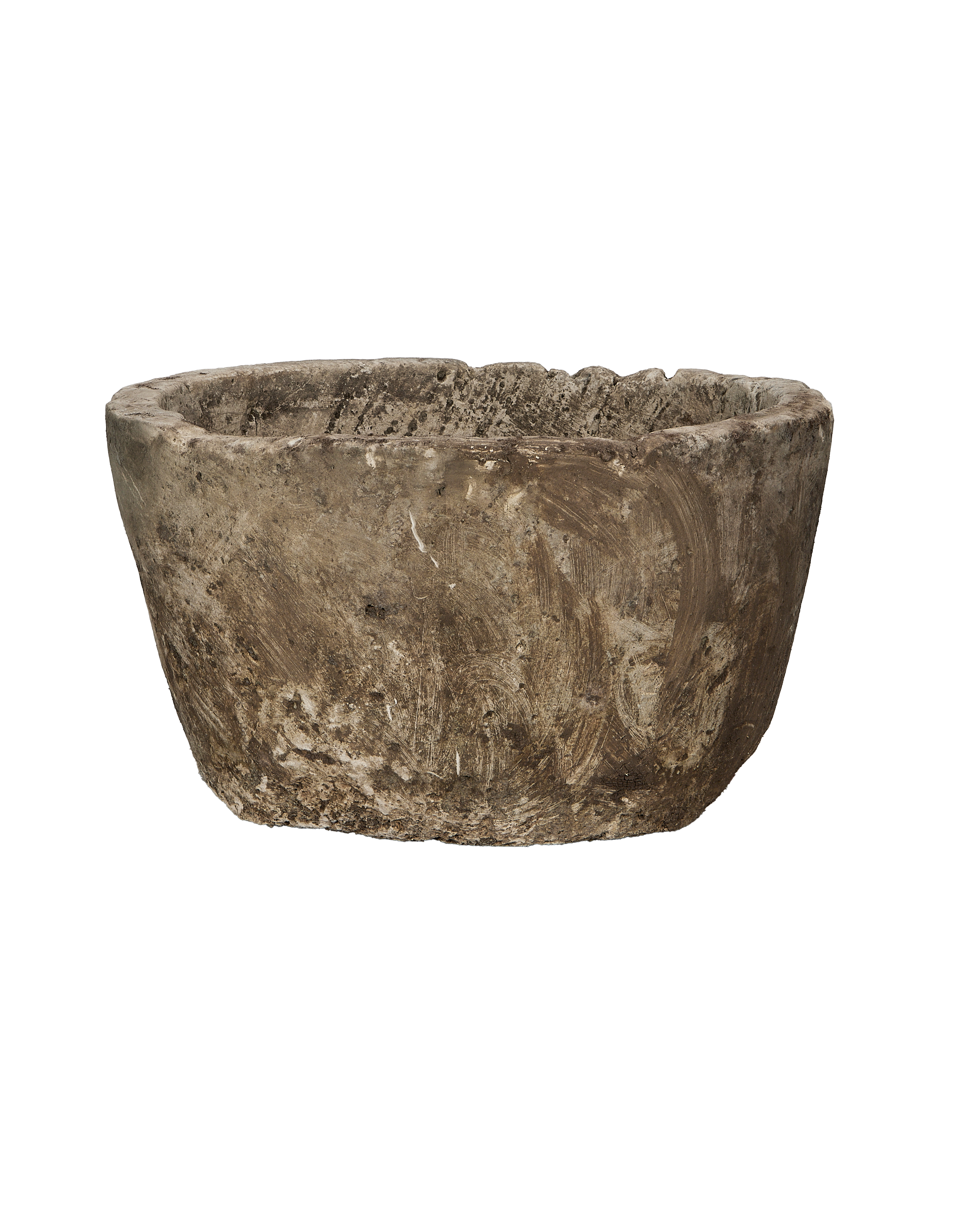 Vintage round Indonesian limestone trough, showing close-up of rough textured exterior.