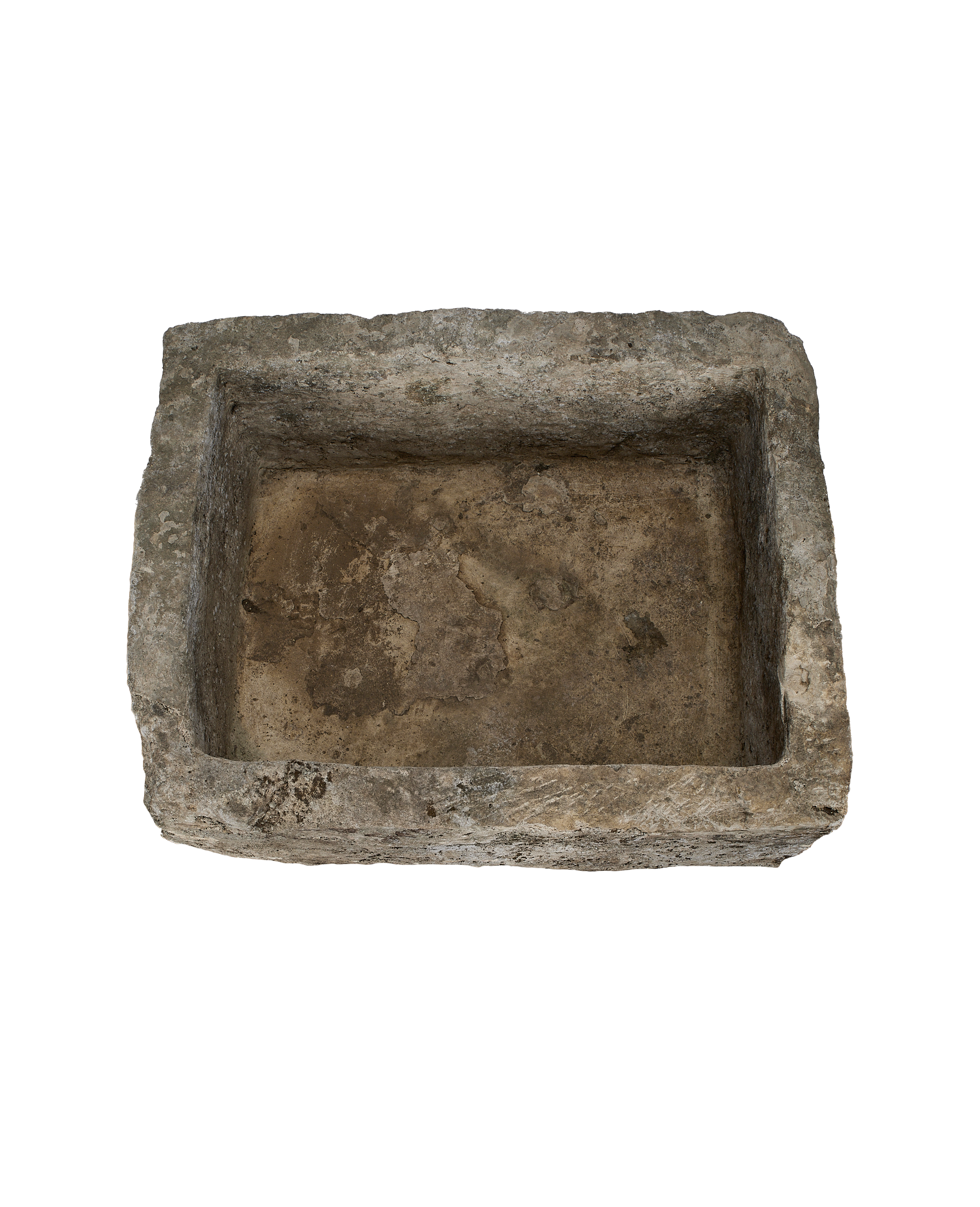 Vintage rectangular limestone trough, top-down view highlighting weathered interior texture, Indonesia.