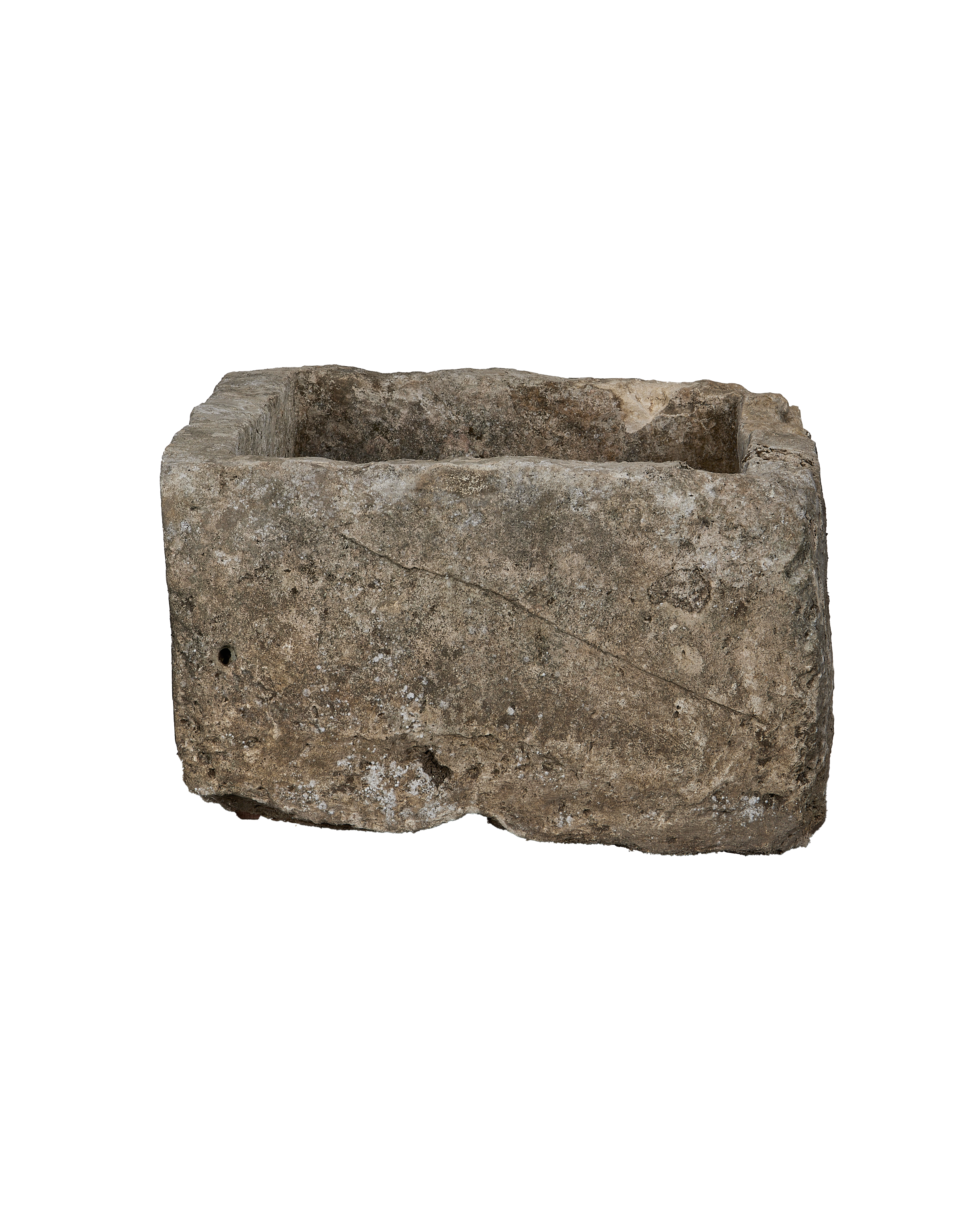 Full view of rectangular vintage Indonesian limestone trough with textured surface and rough edges.