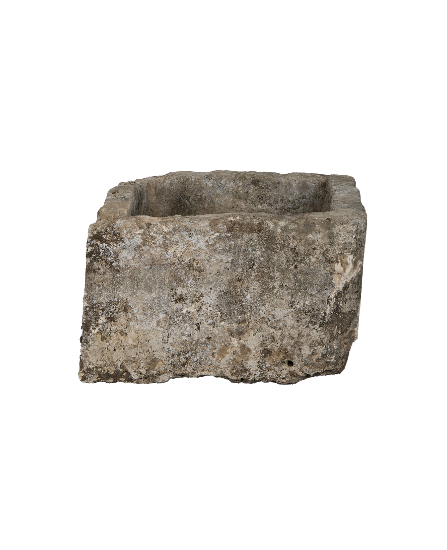 Vintage rectangular Indonesian limestone trough with rough, weathered surface texture and aged condition.