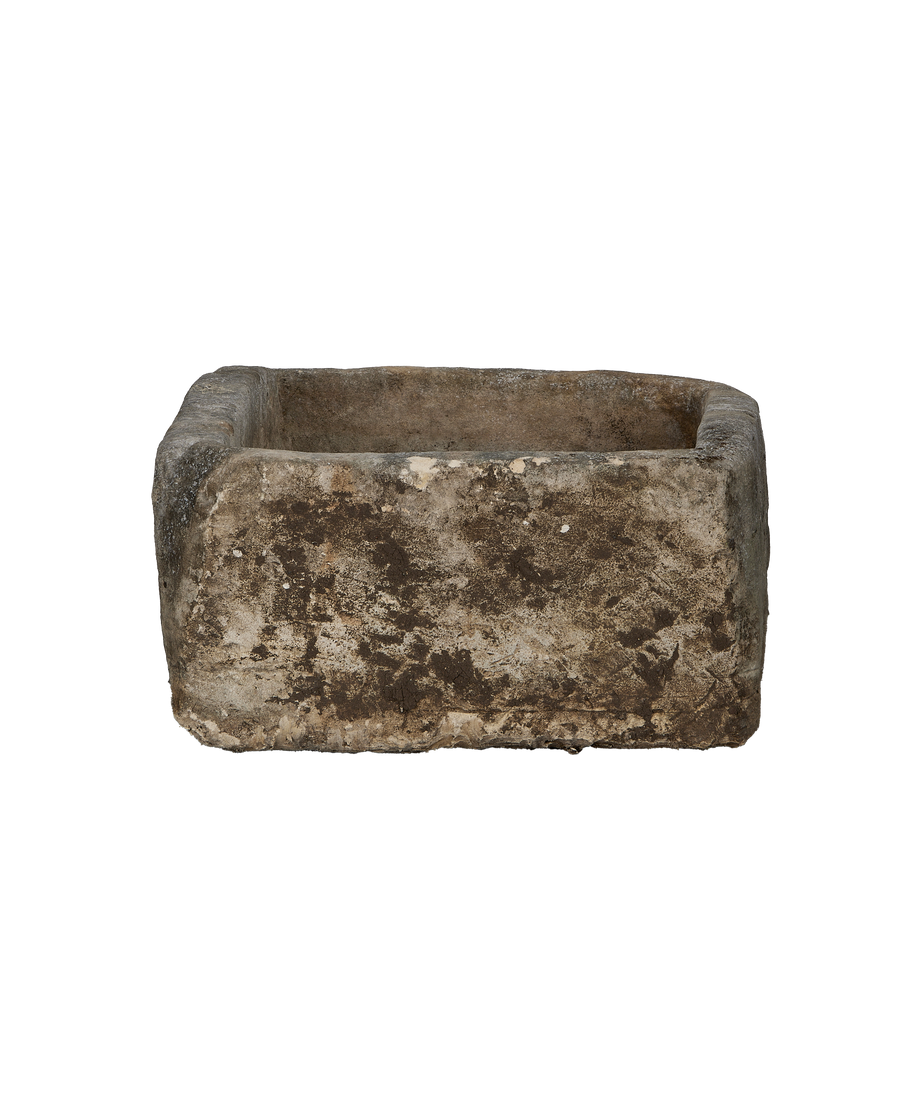 Vintage Indonesian rectangular limestone trough, showcasing textured exterior with weathered details and natural patina.