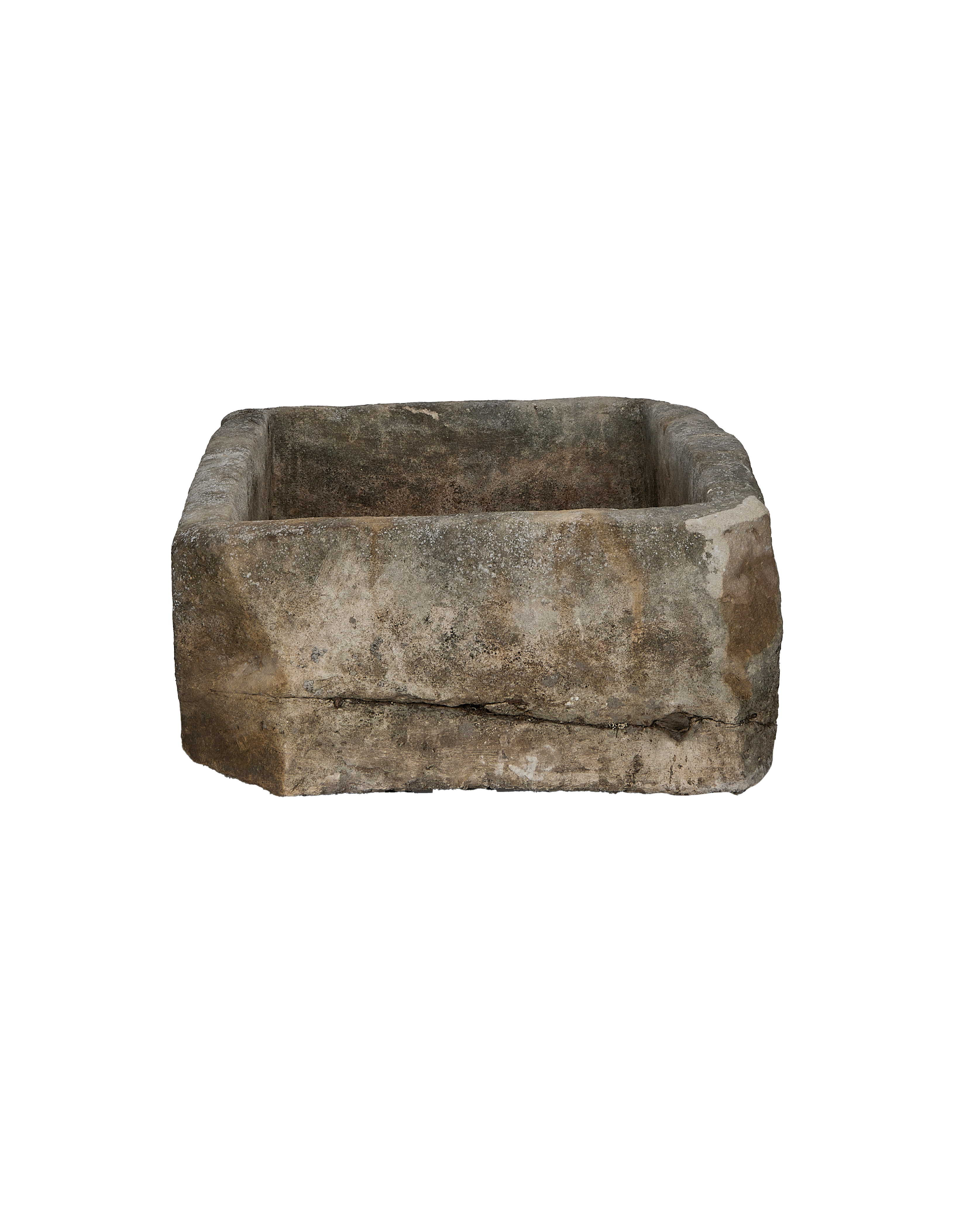Vintage rectangular limestone trough, Oakland, Indonesia, showing textured side with natural crack detail.