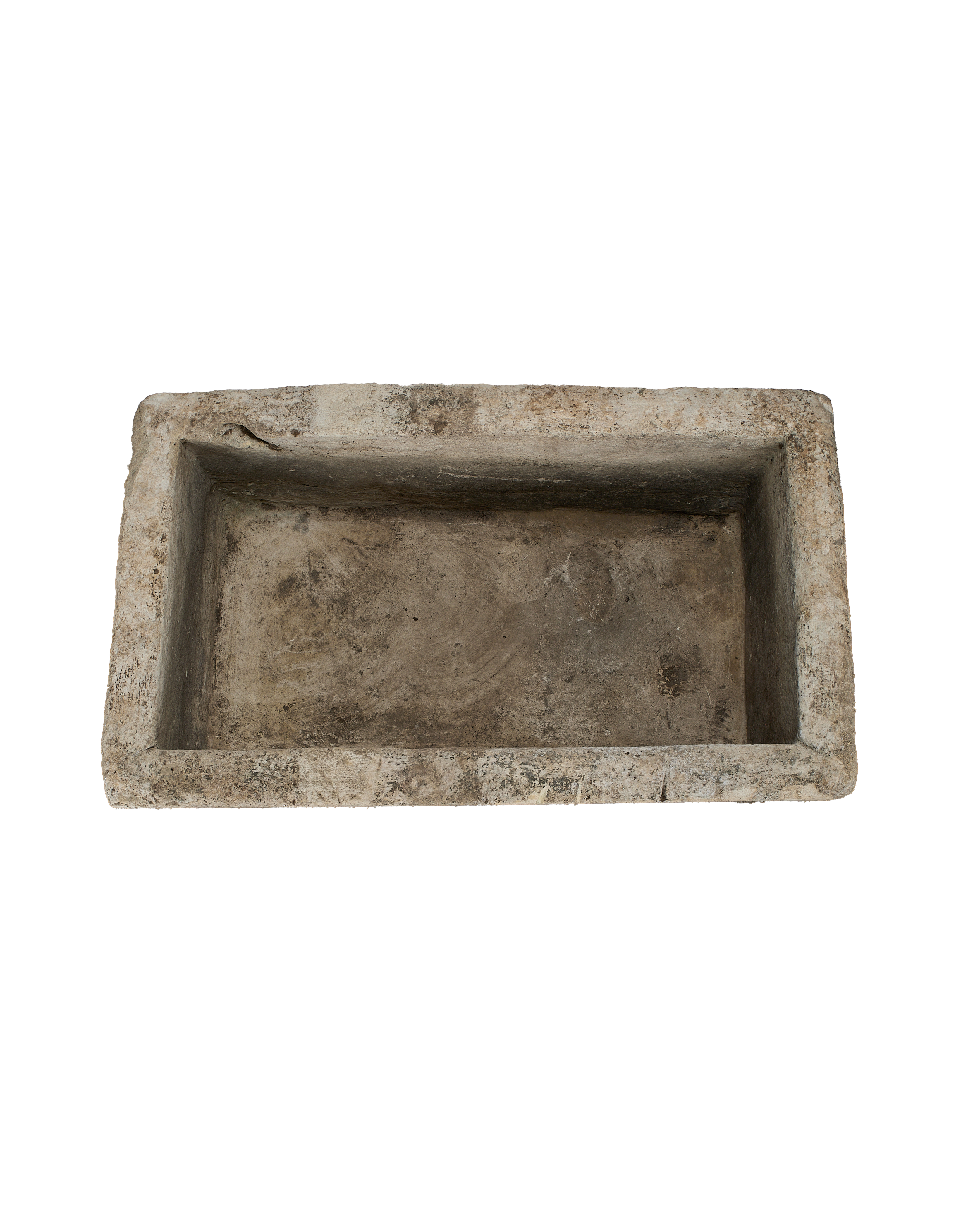Vintage rectangular limestone trough, rustic texture, top-down view showing interior depth.