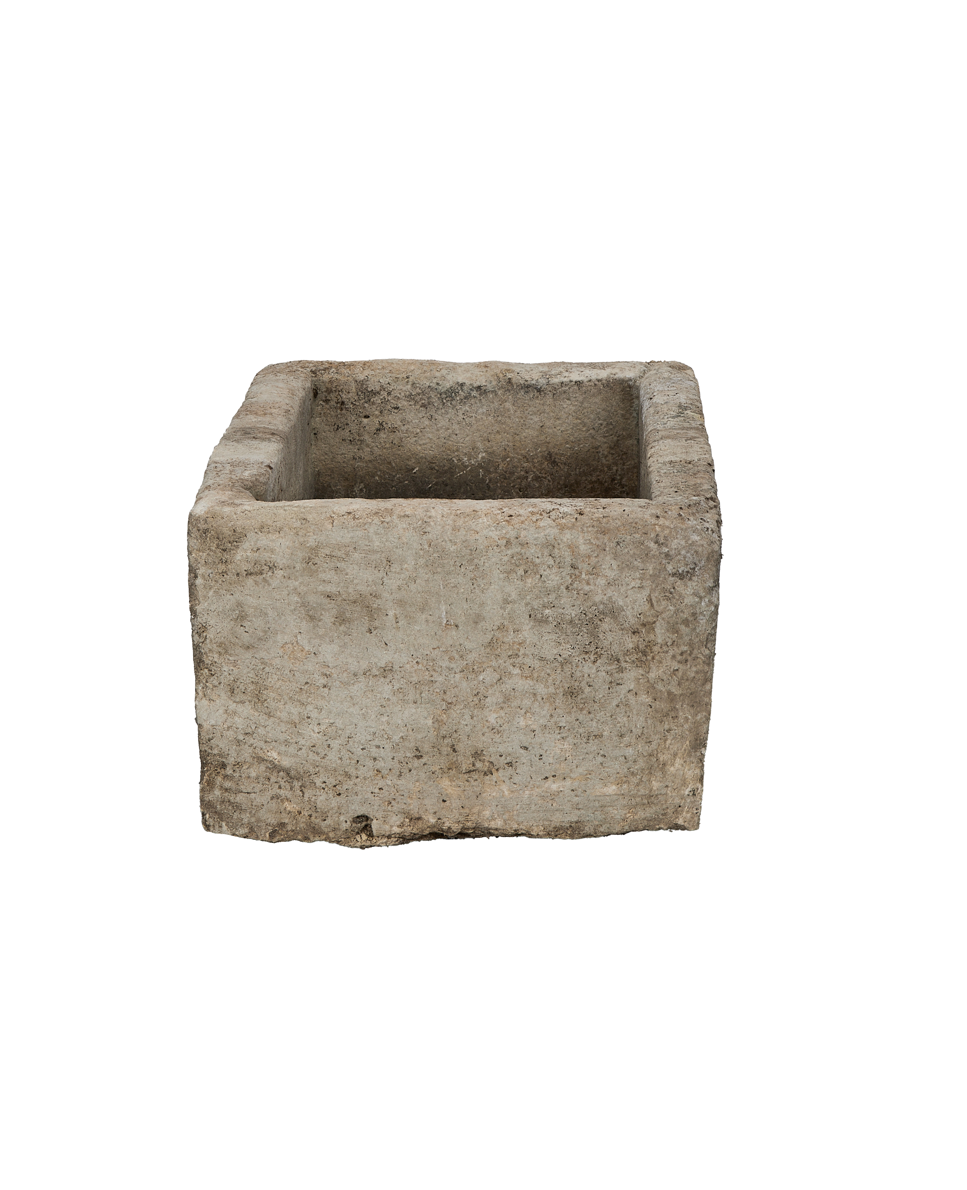 Vintage Indonesian limestone trough viewed from inside, showing distressed surface texture.