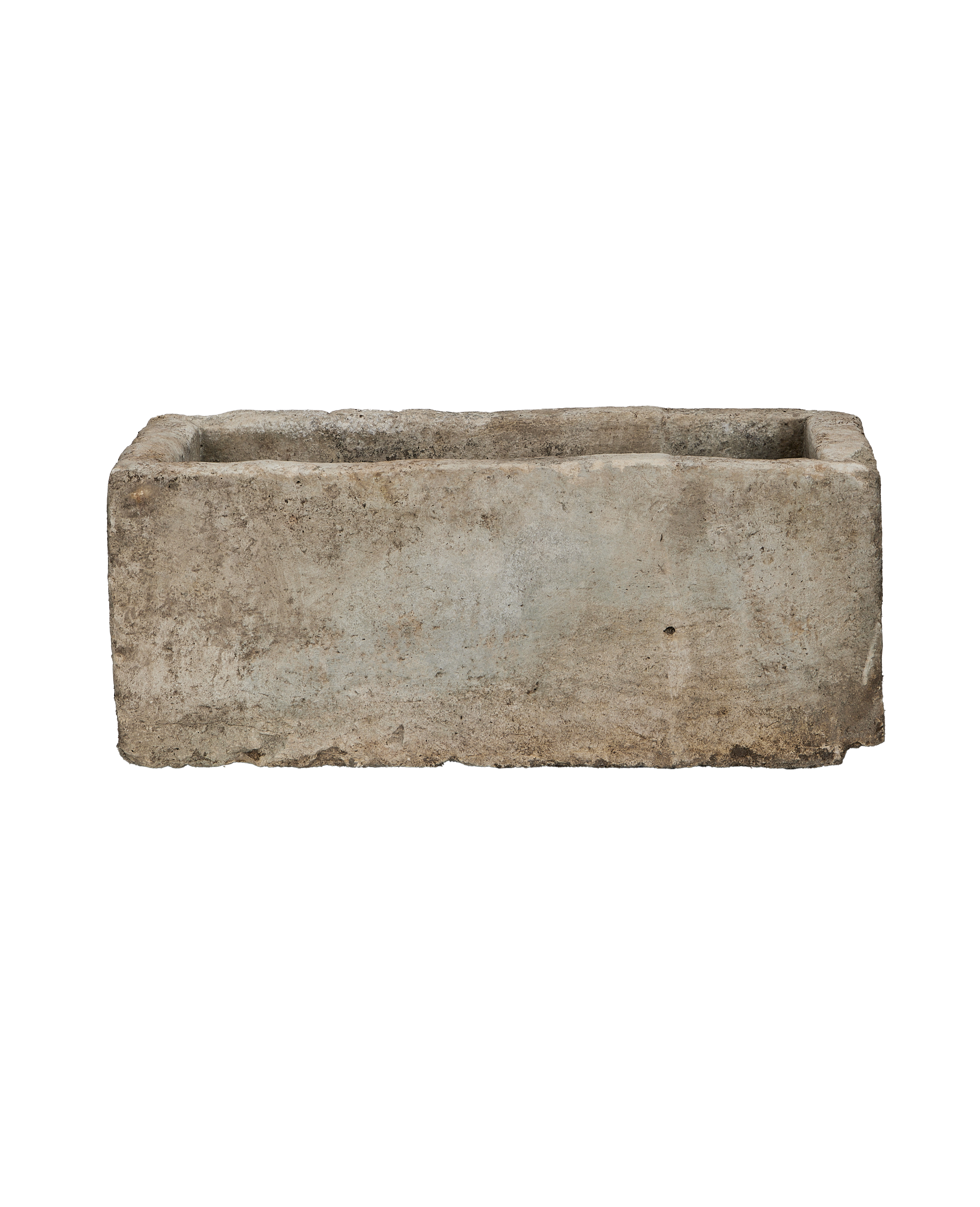 Vintage rectangular Indonesian limestone trough, showing weathered texture on its long side.