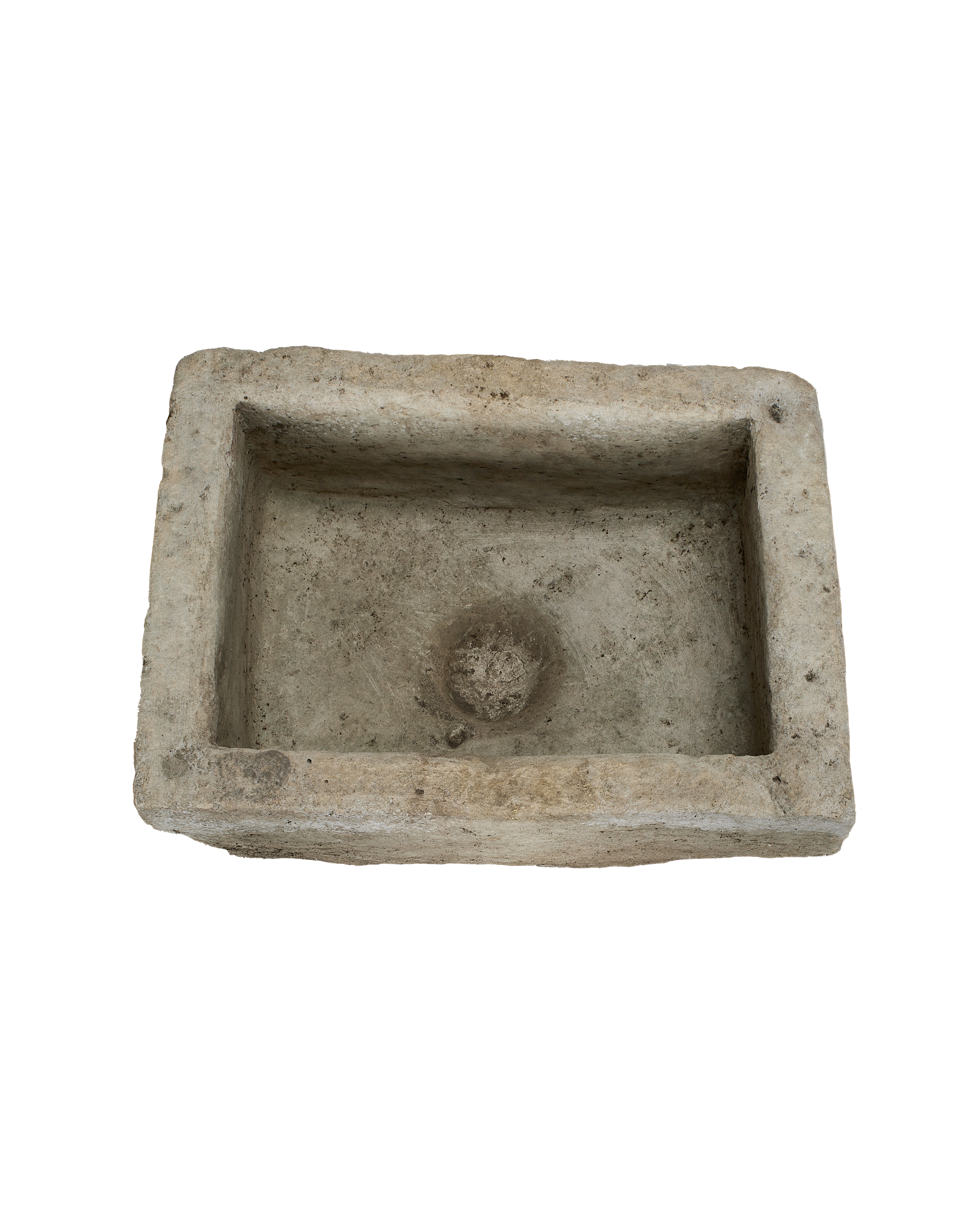 Vintage limestone trough, top-down view highlighting the rectangular form and natural drain hole.