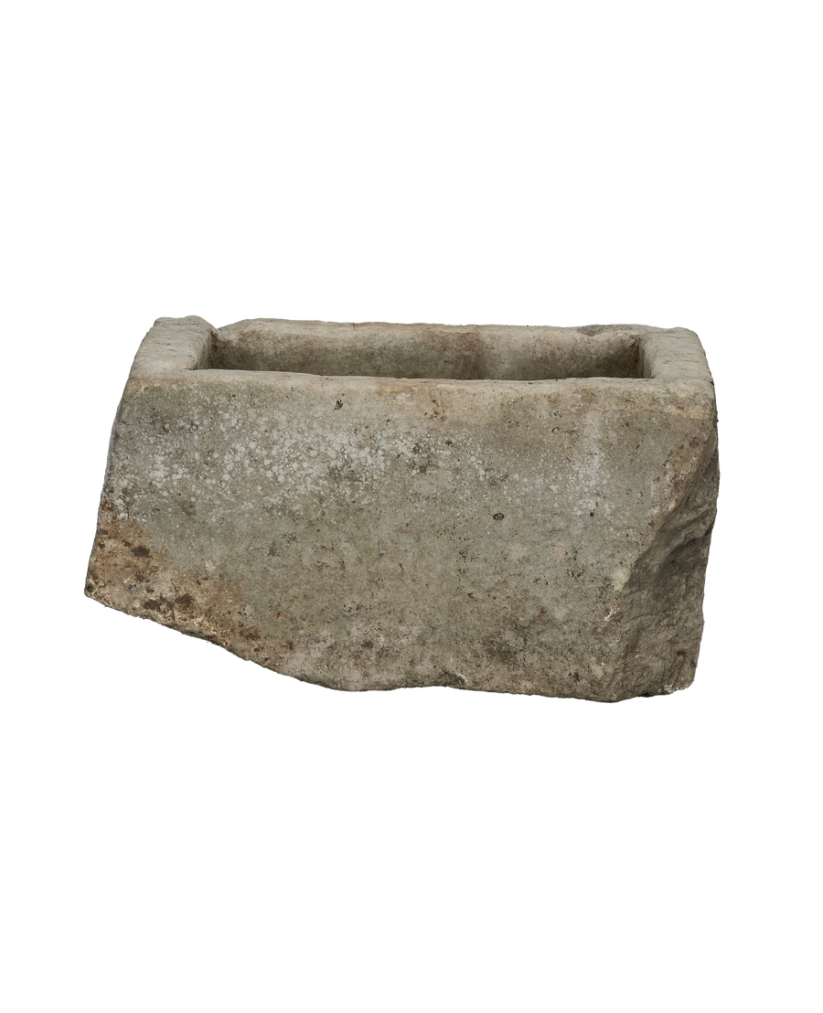 Vintage Indonesian limestone trough, OAK style, showing weathered texture and natural imperfections.
