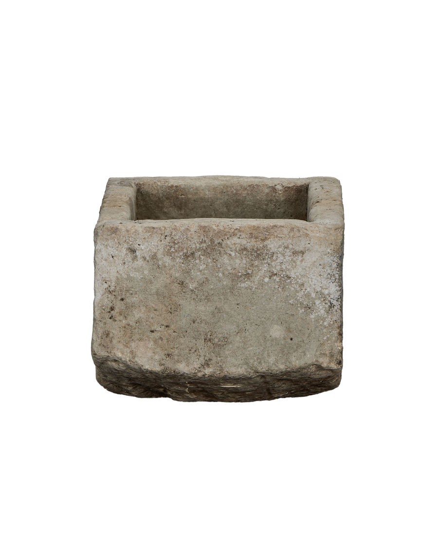 Vintage Indonesian limestone trough (OAK) front angle, showing weathered texture and rectangular shape.