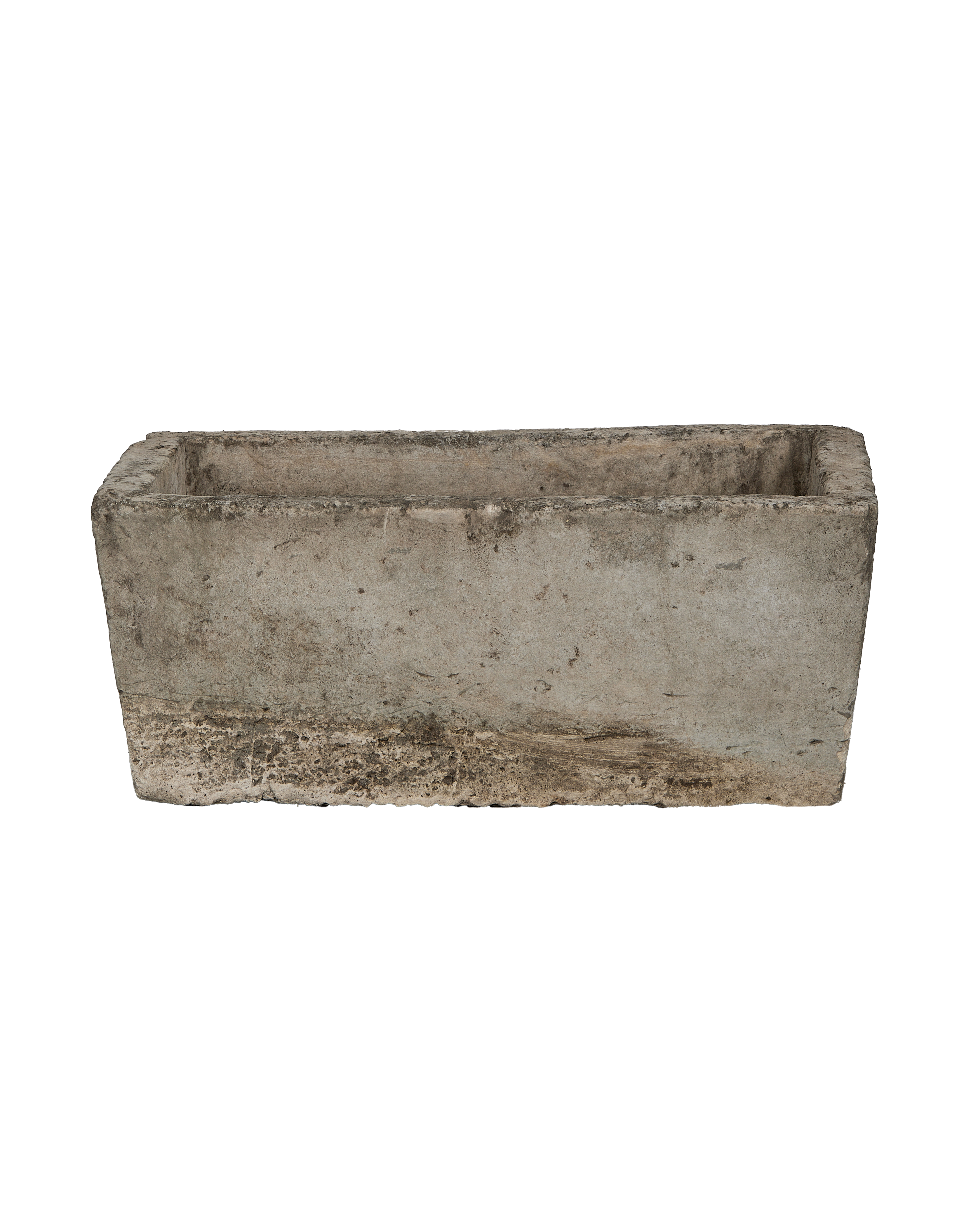 Vintage rectangular limestone trough, weathered gray, with darkened bottom edge, isolated view from Bali.