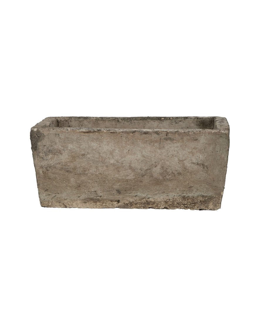 Rectangular vintage Indonesian limestone trough with textured weathered sides, showcasing its aged character.