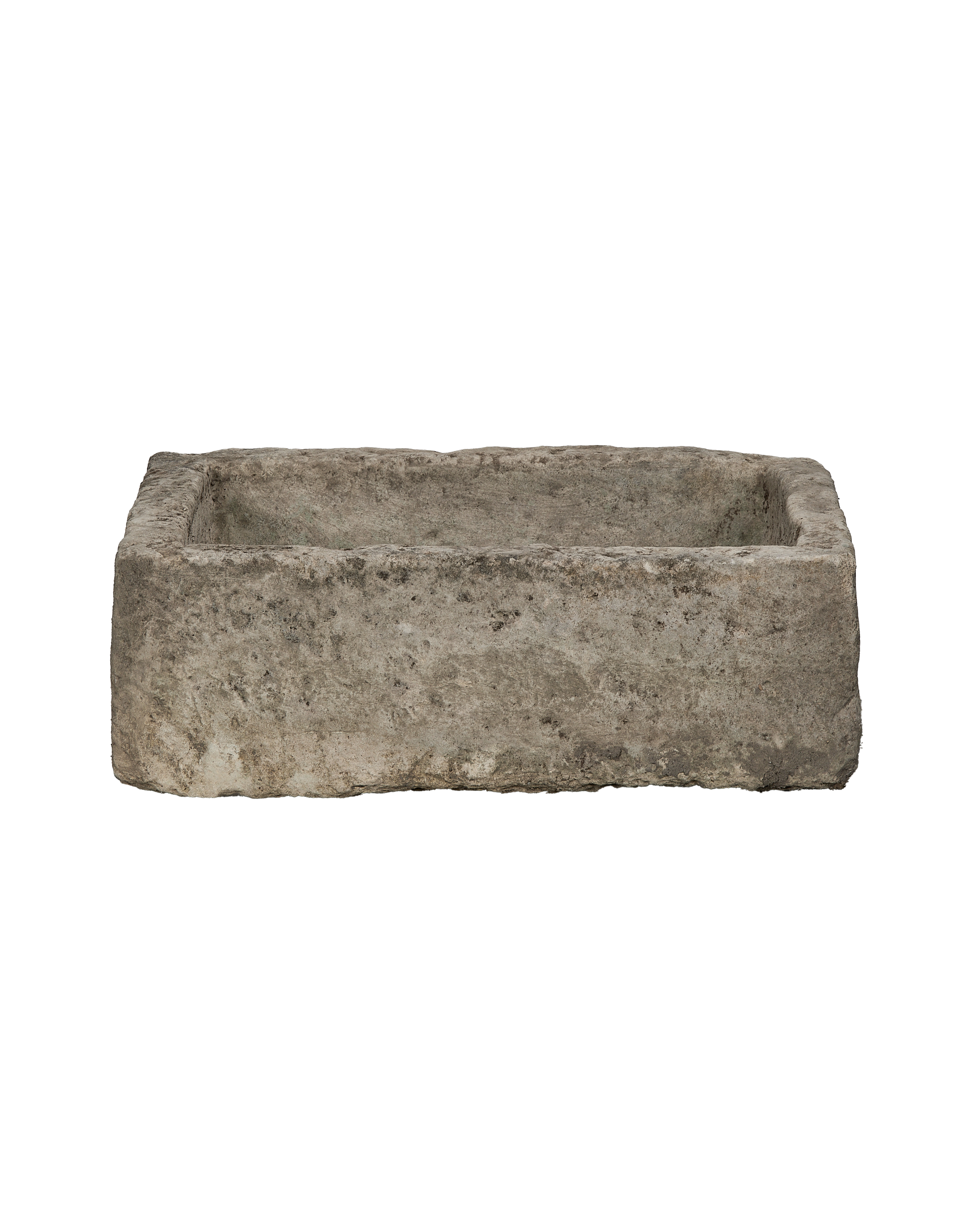 Vintage Indonesian rectangular limestone trough, detailed weathered texture, side view.