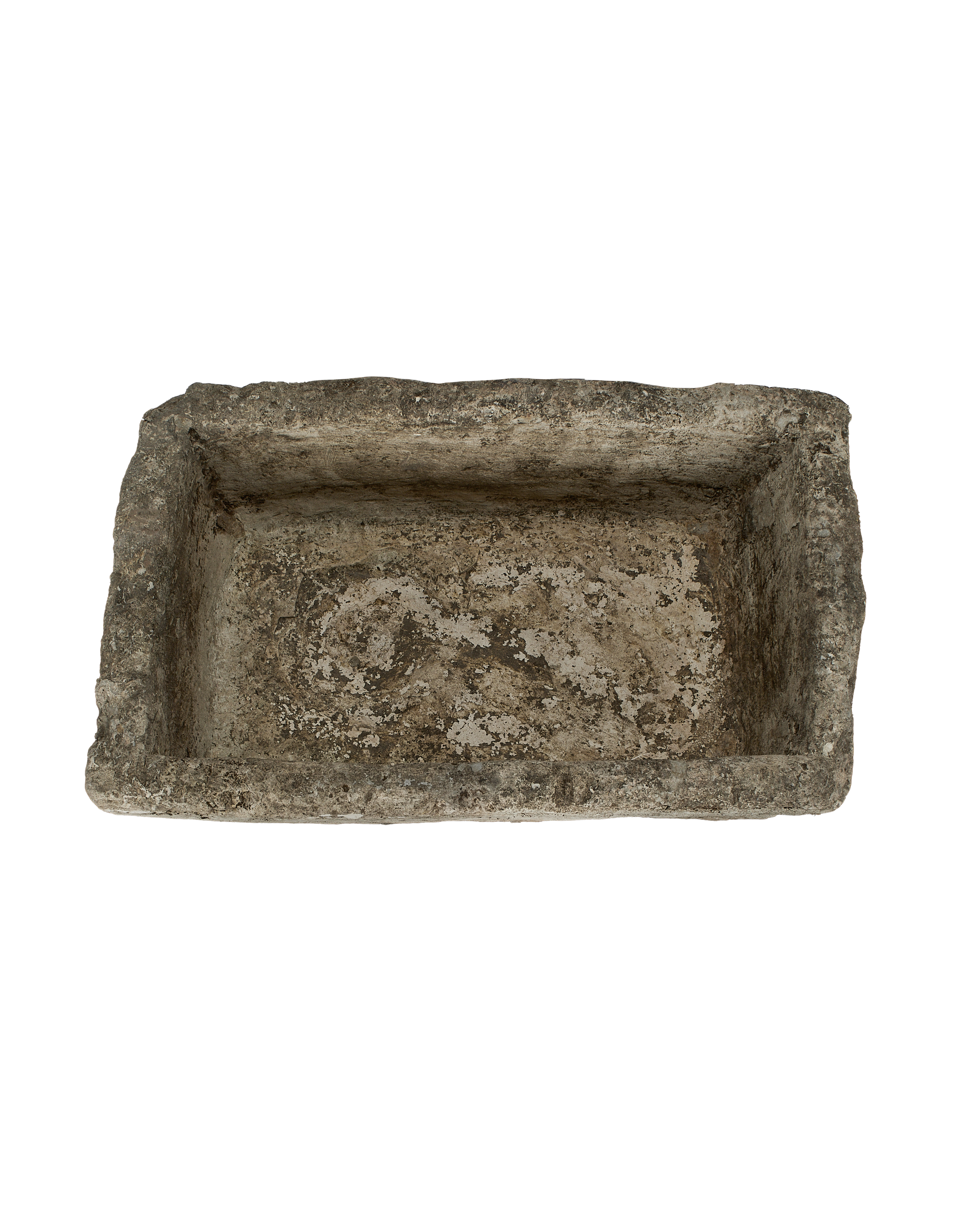 Vintage rectangular limestone trough, top view reveals weathered gray-brown interior, Indonesia.