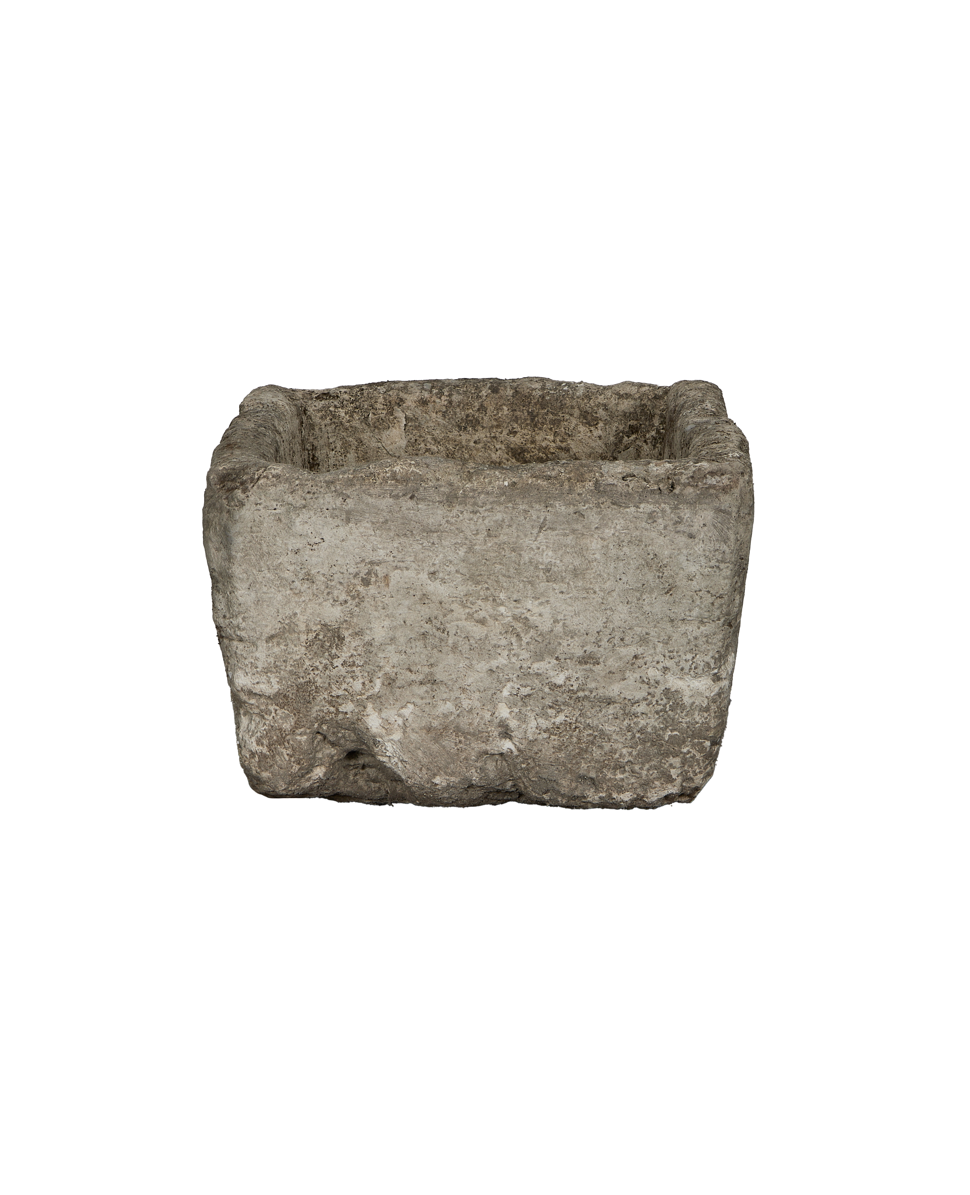 Vintage rectangular Indonesian limestone trough, showing rugged, weathered texture front view.