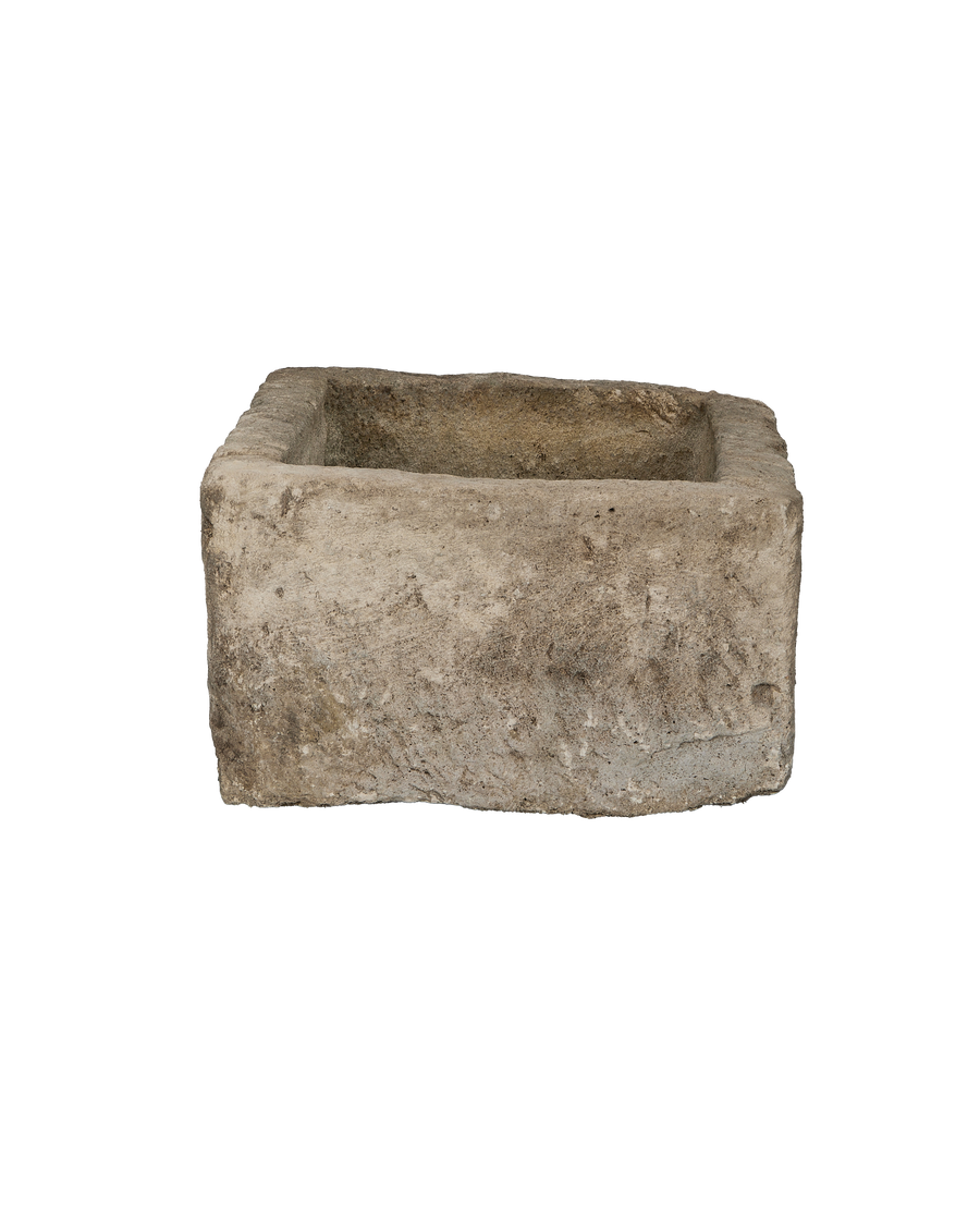 Vintage Indonesian rectangular limestone trough, front-facing view, showcasing rough weathered texture and natural gray patina.
