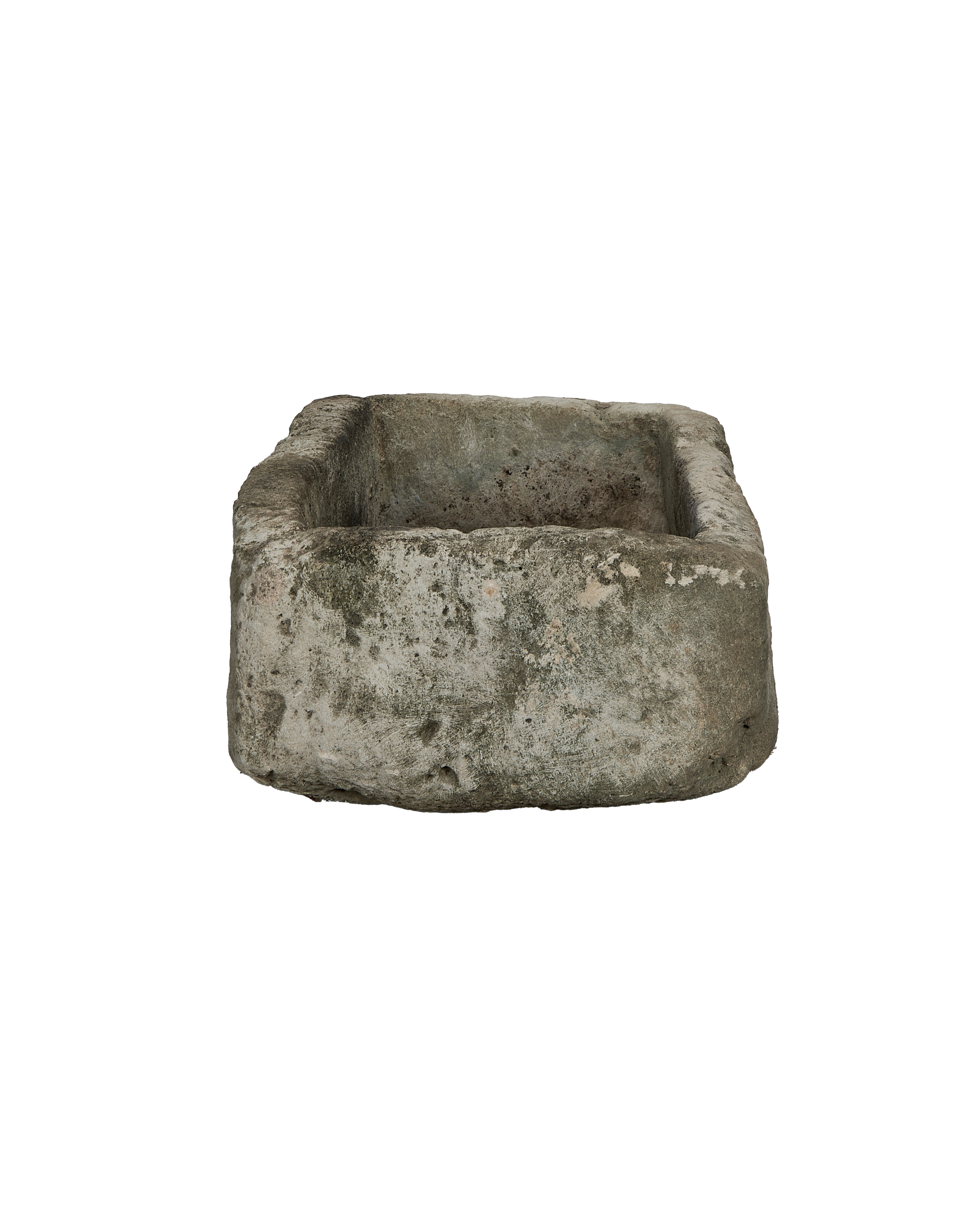 Vintage limestone trough, rectangular, showing textural weathered surface and inner basin from Indonesia.