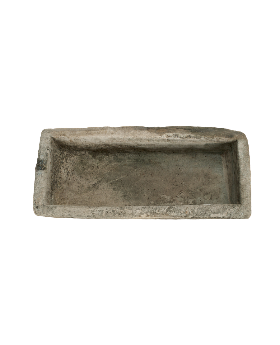 Vintage rectangular Indonesian limestone trough, top-down perspective, showing aged, rough texture.