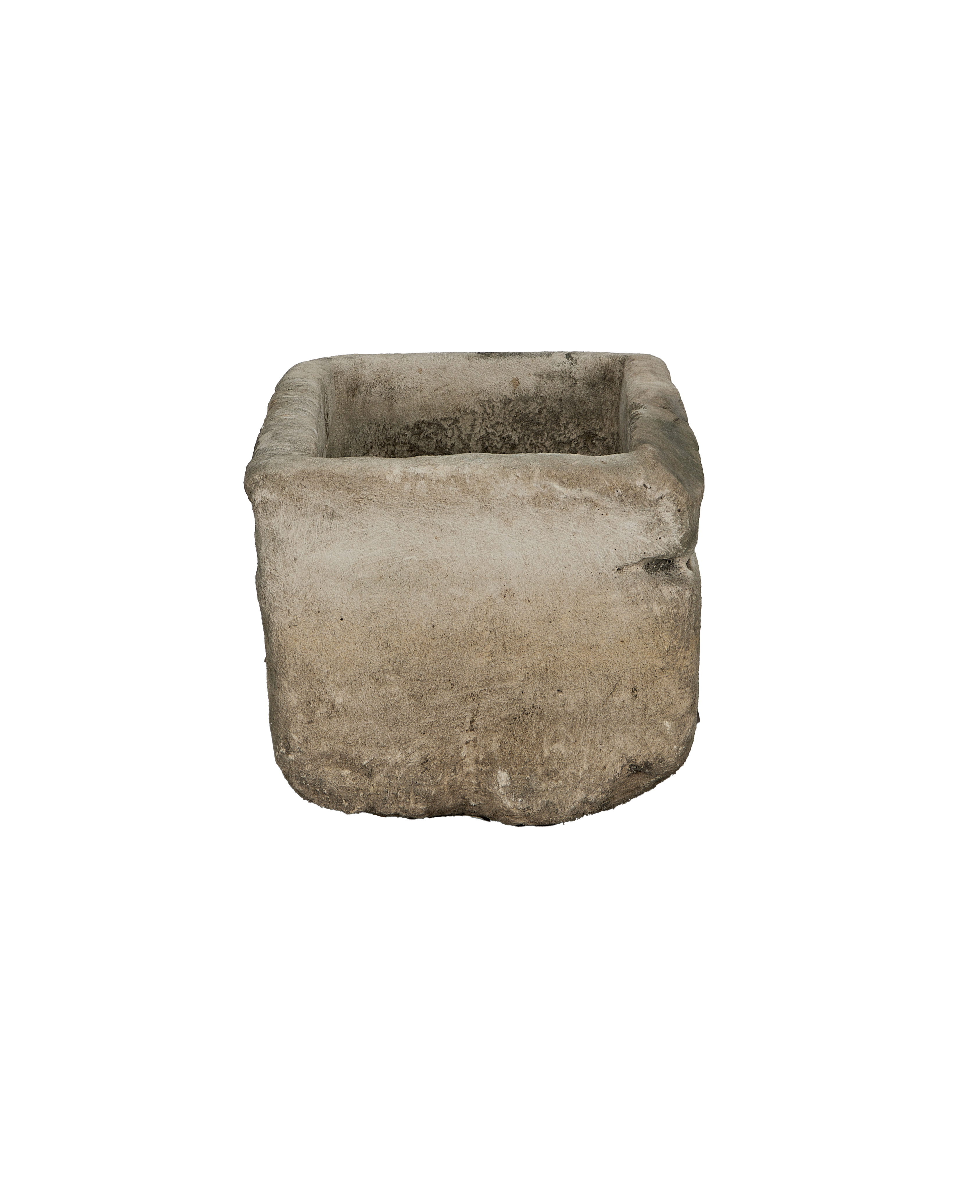 Vintage rectangular limestone trough, showing the weathered texture on its rough sides and aged interior.