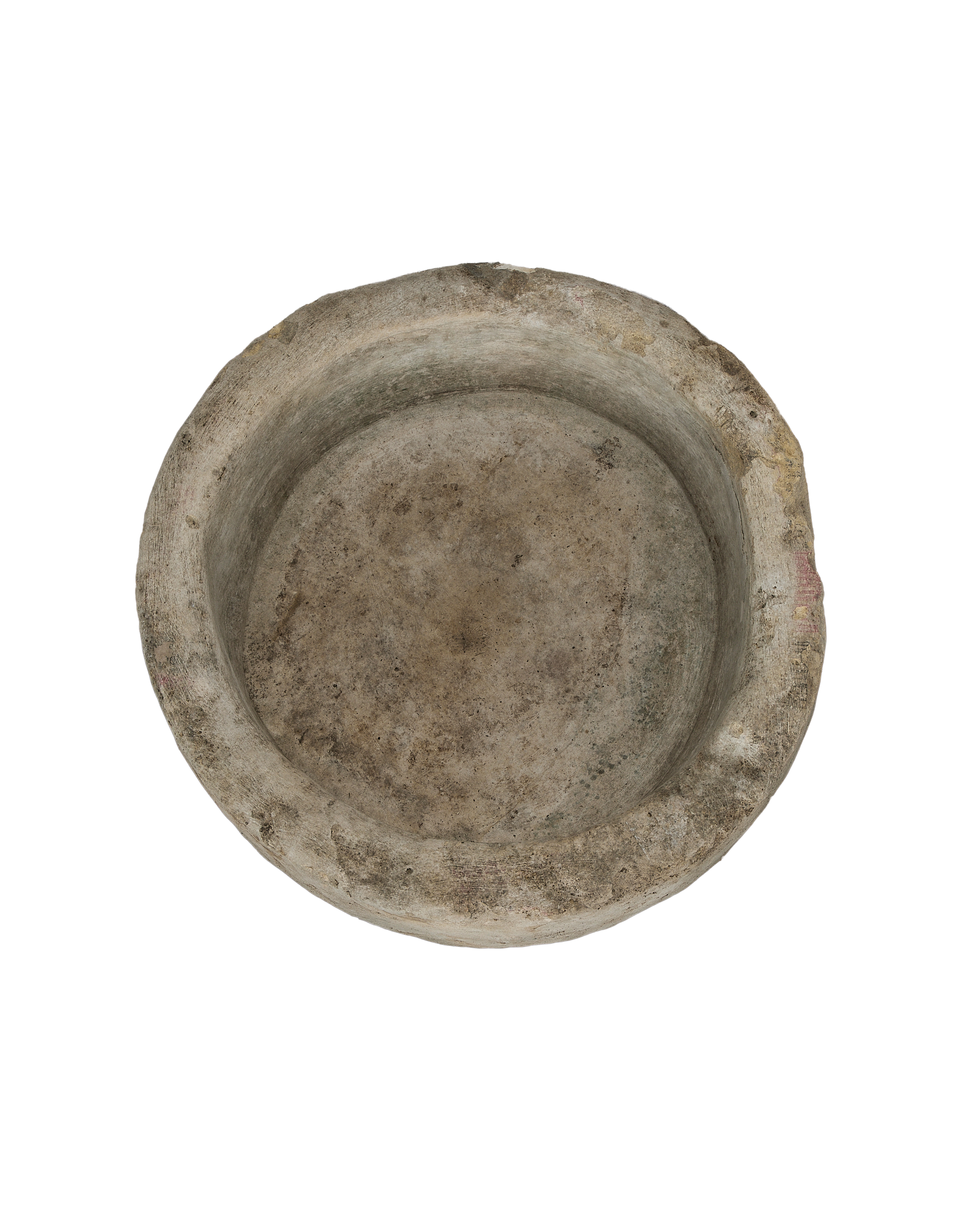 Round vintage limestone trough, overall aerial view of the worn interior surface.