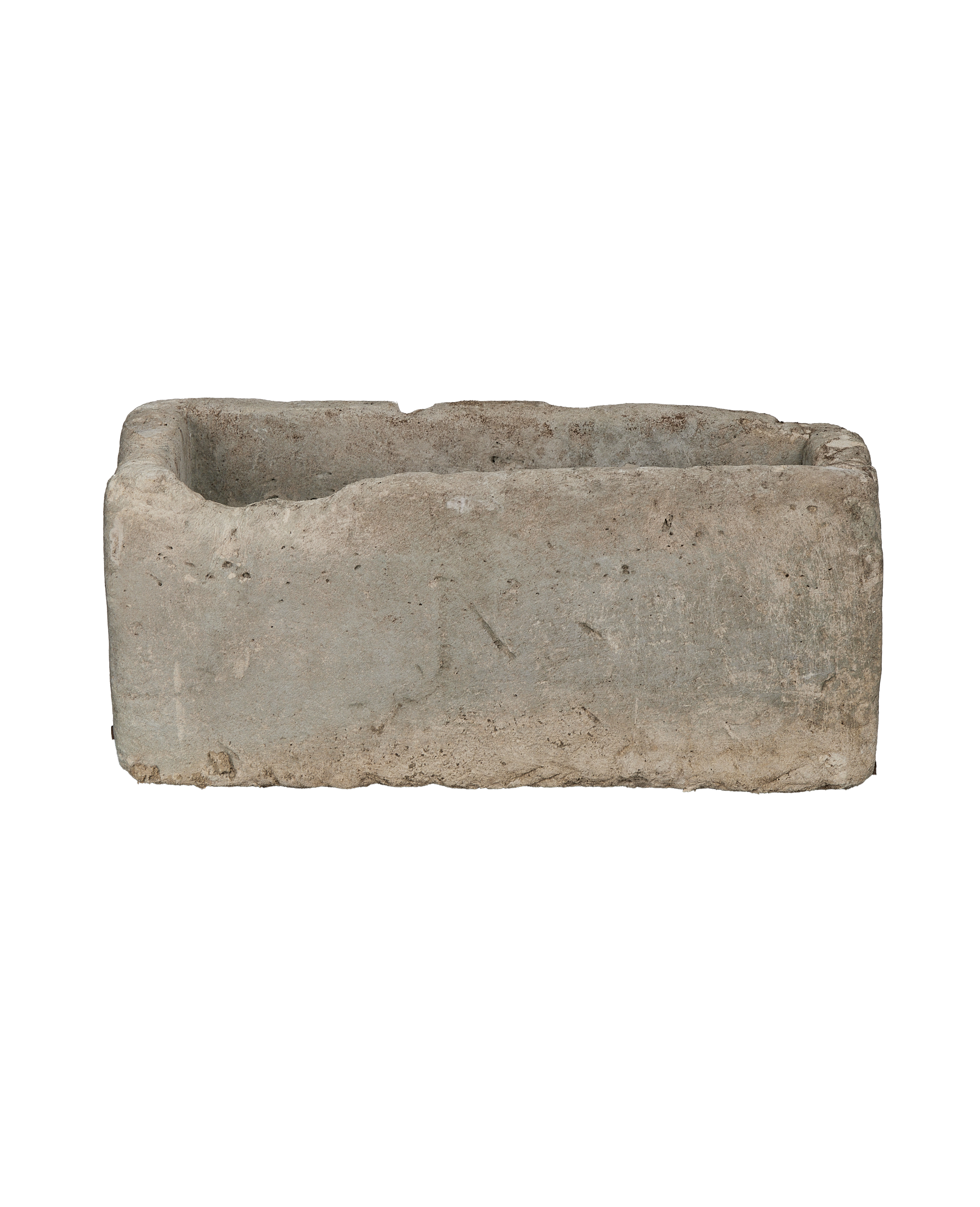 Vintage Indonesian rectangular limestone trough, rugged texture, weathered light gray-tan stone planter.