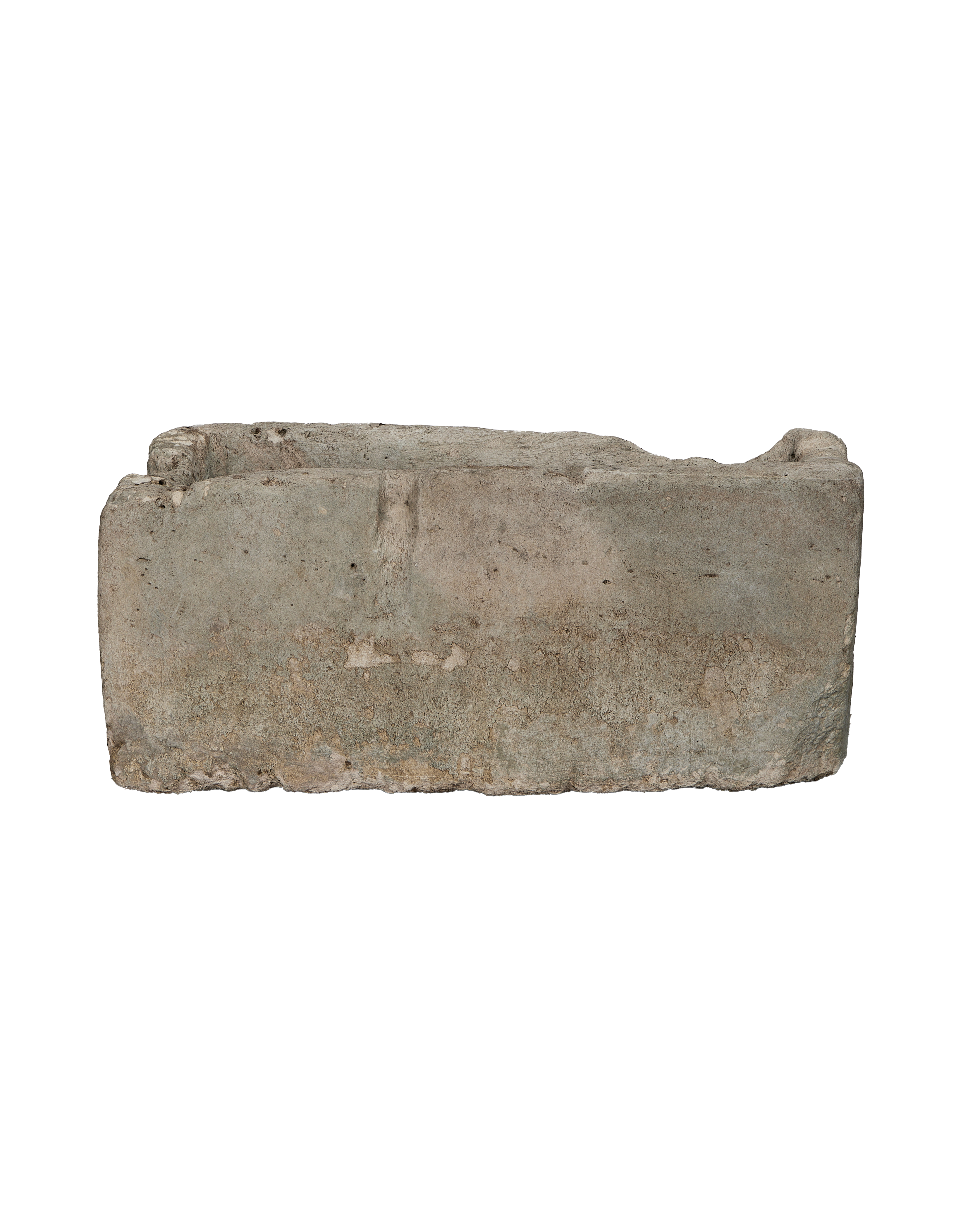Vintage Indonesian limestone trough, rectangular, rough textured surface with worn edges.