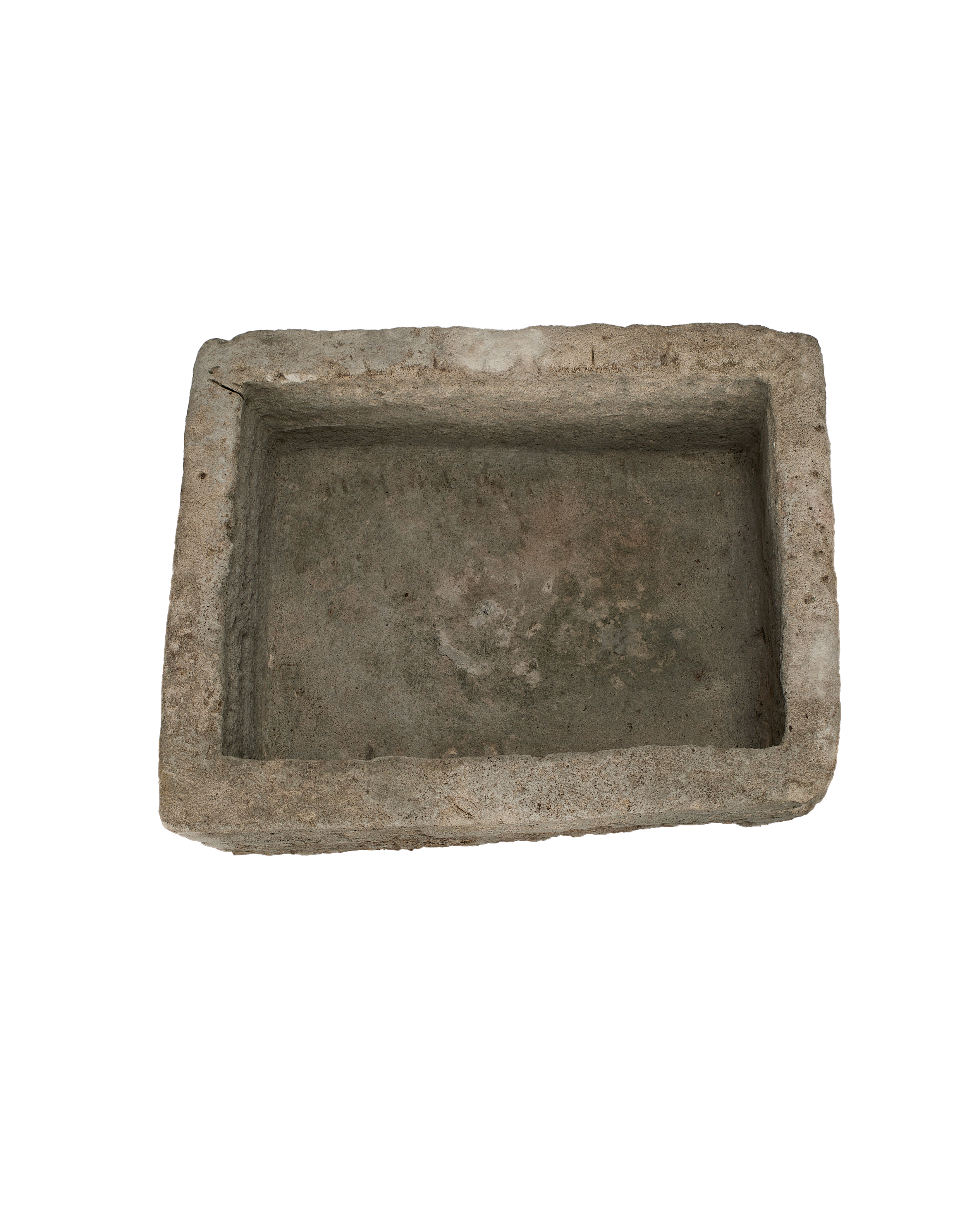 Vintage Indonesian limestone trough, top-down view highlighting the rectangular shape and rough textured interior.