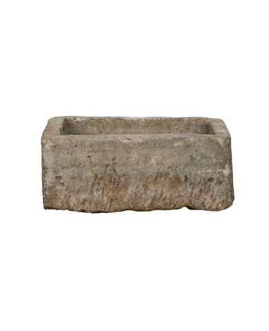 Vintage rectangular Indonesian limestone trough with weathered, textured grey-brown surface.