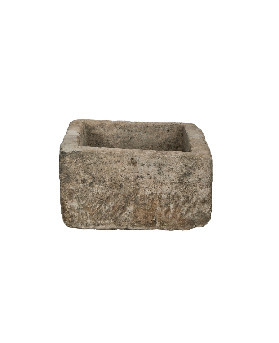 Vintage Indonesian limestone trough, rectangular, showcasing its weathered texture and sturdy build.