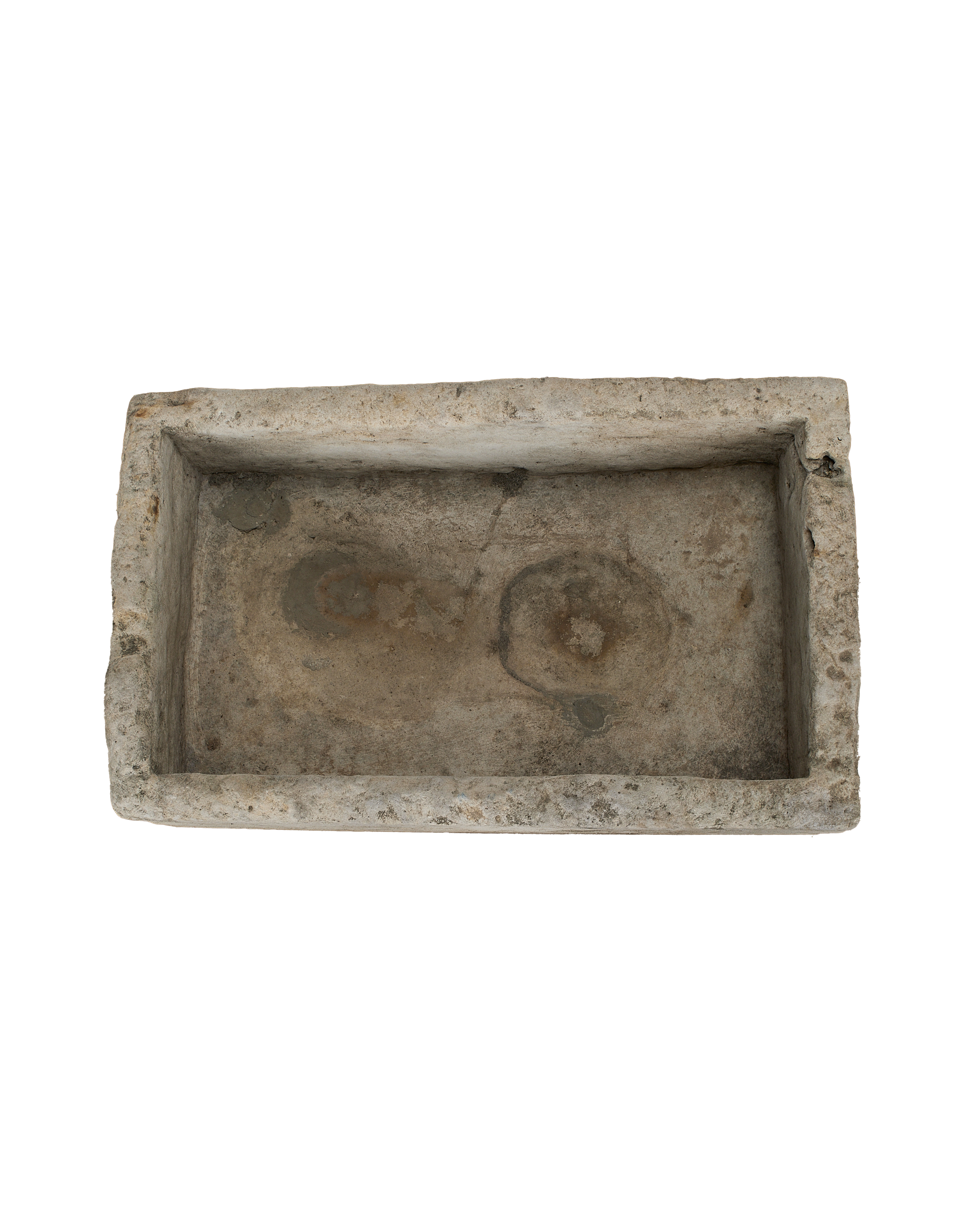 Vintage rectangle Indonesian limestone trough, showing weathered interior with original circular markings.