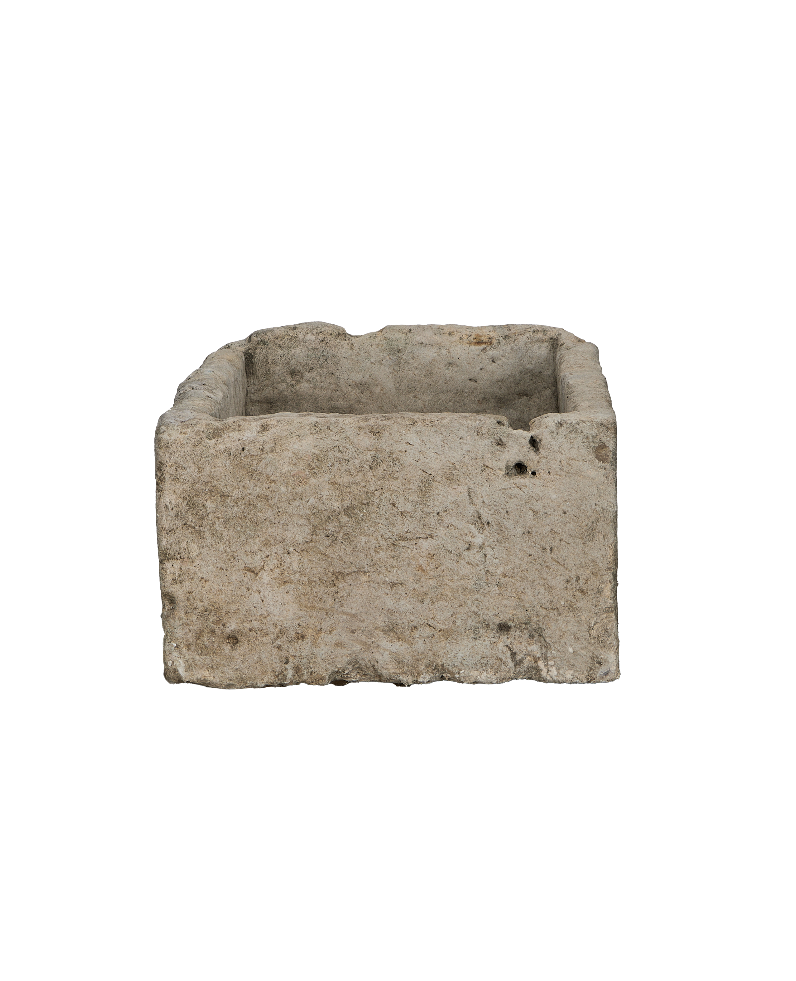 Vintage rectangular limestone trough, side view revealing rustic texture and natural imperfections.