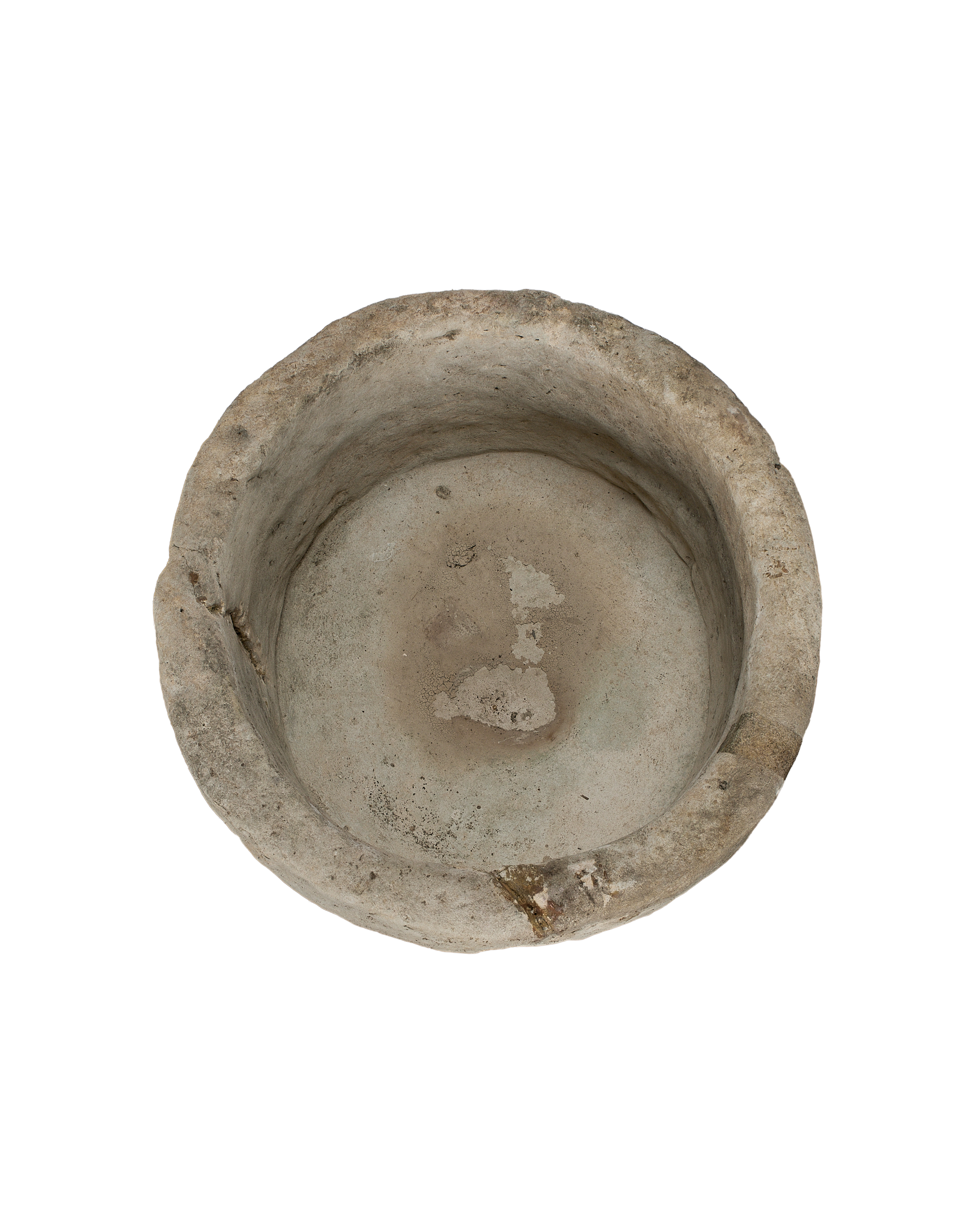 Vintage Indonesian limestone trough viewed from directly above, showing interior wear.