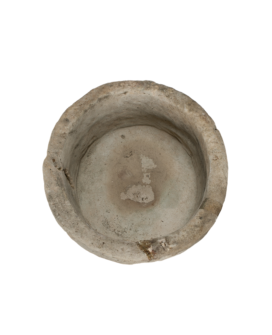 Vintage Indonesian limestone trough viewed from directly above, showing interior wear.