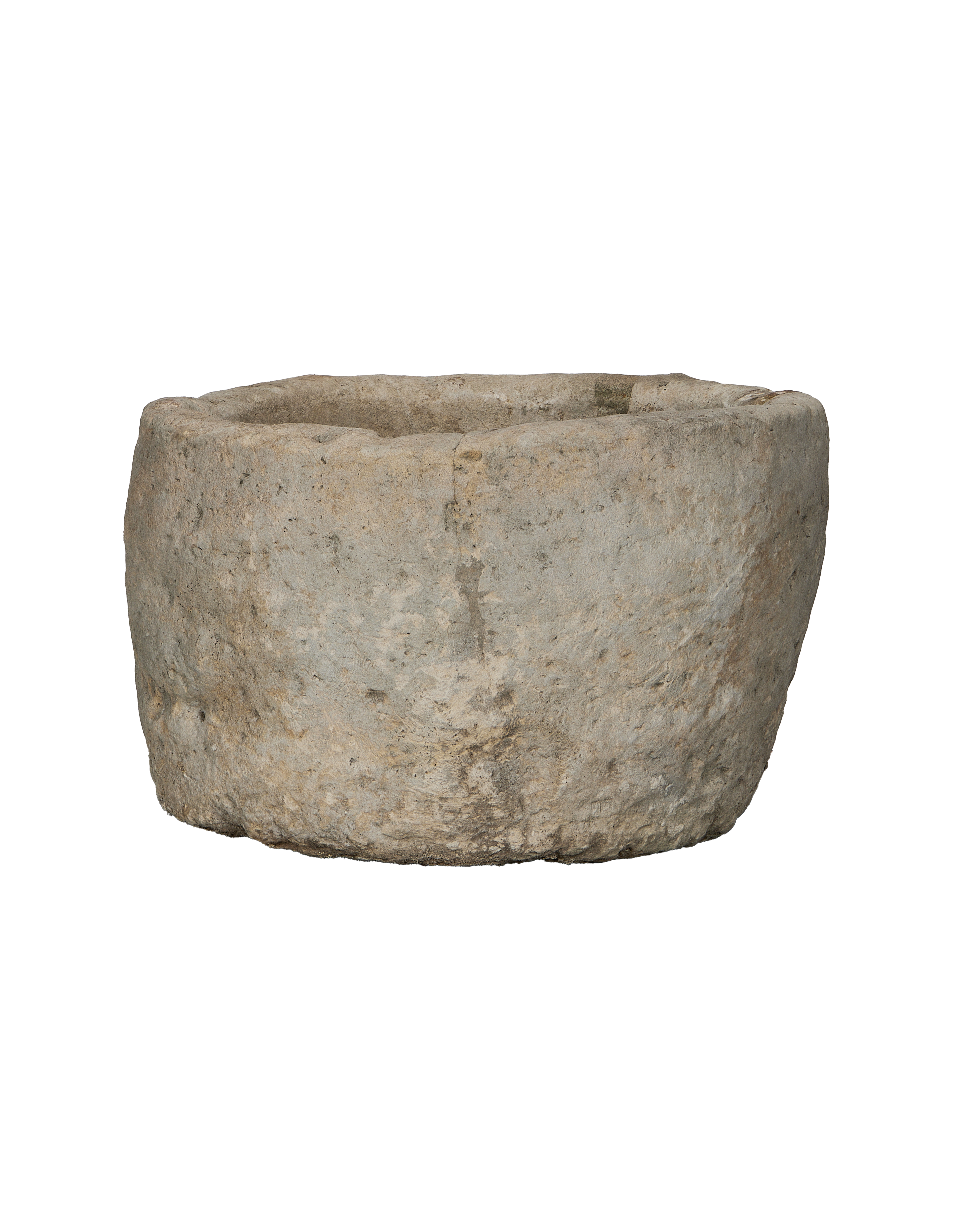 Vintage round limestone trough from Indonesia, showing rough texture and weathered finish.