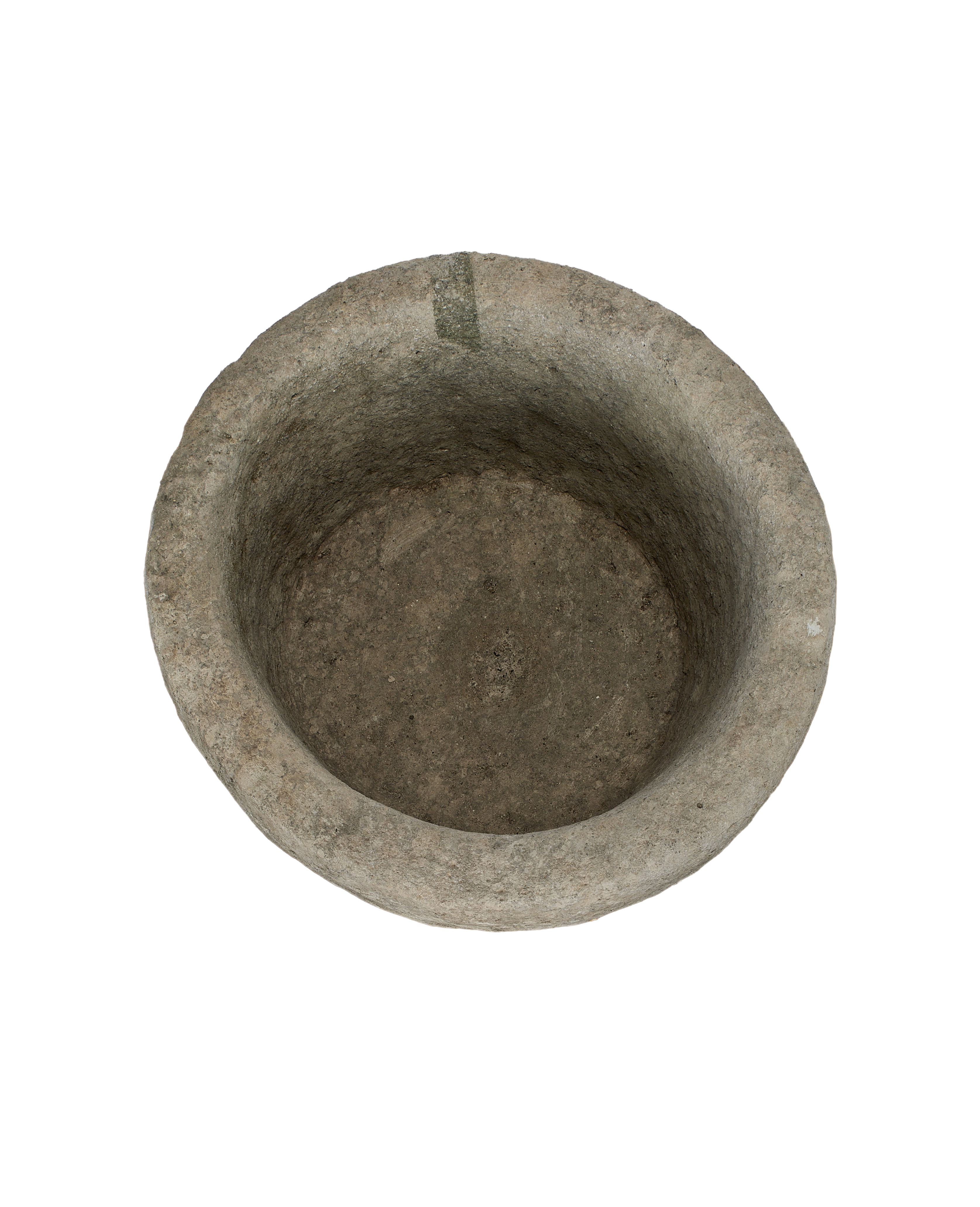 Vintage round Indonesian limestone trough, top-down view showing interior texture and depth.