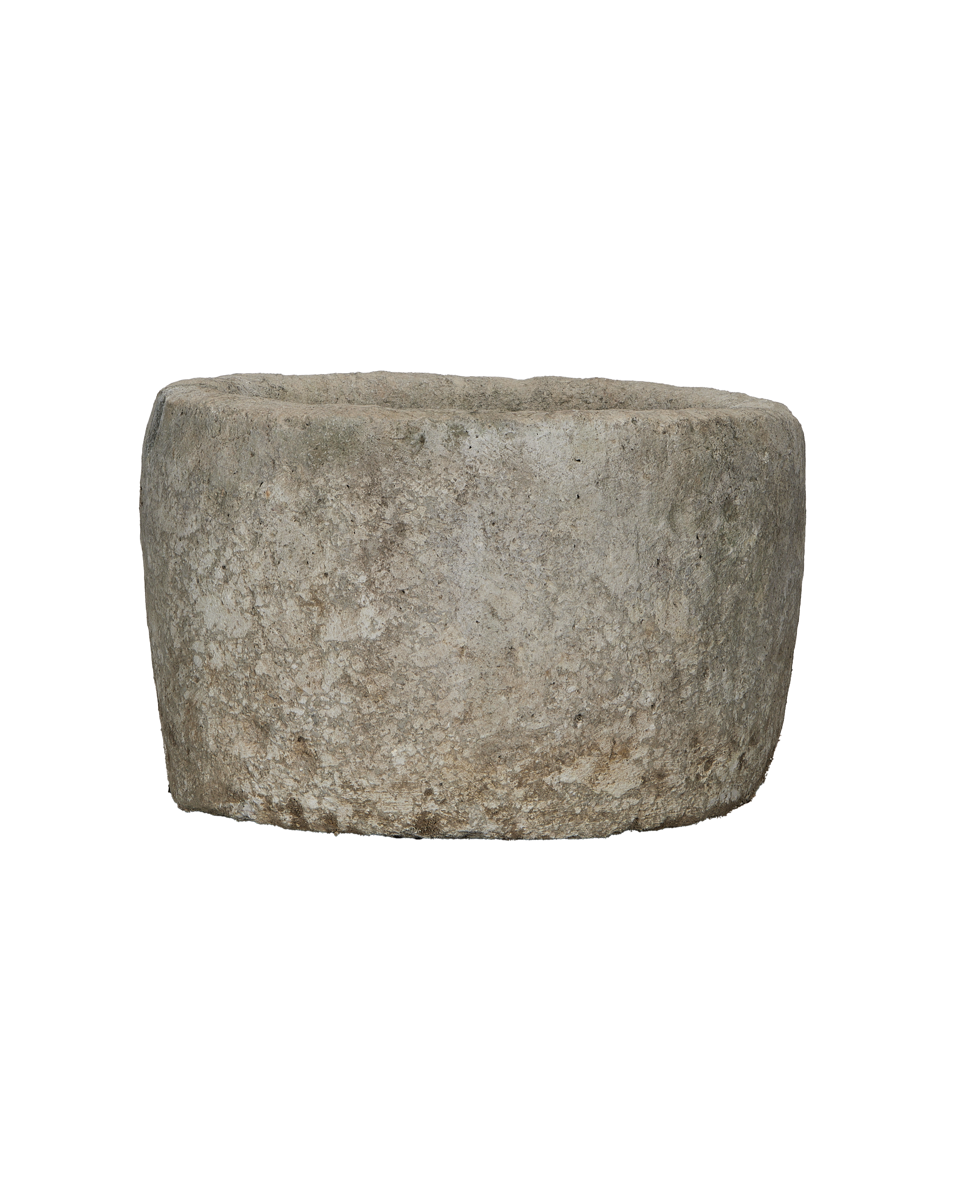 Vintage round limestone trough, side view, showing weathered texture and natural imperfections.