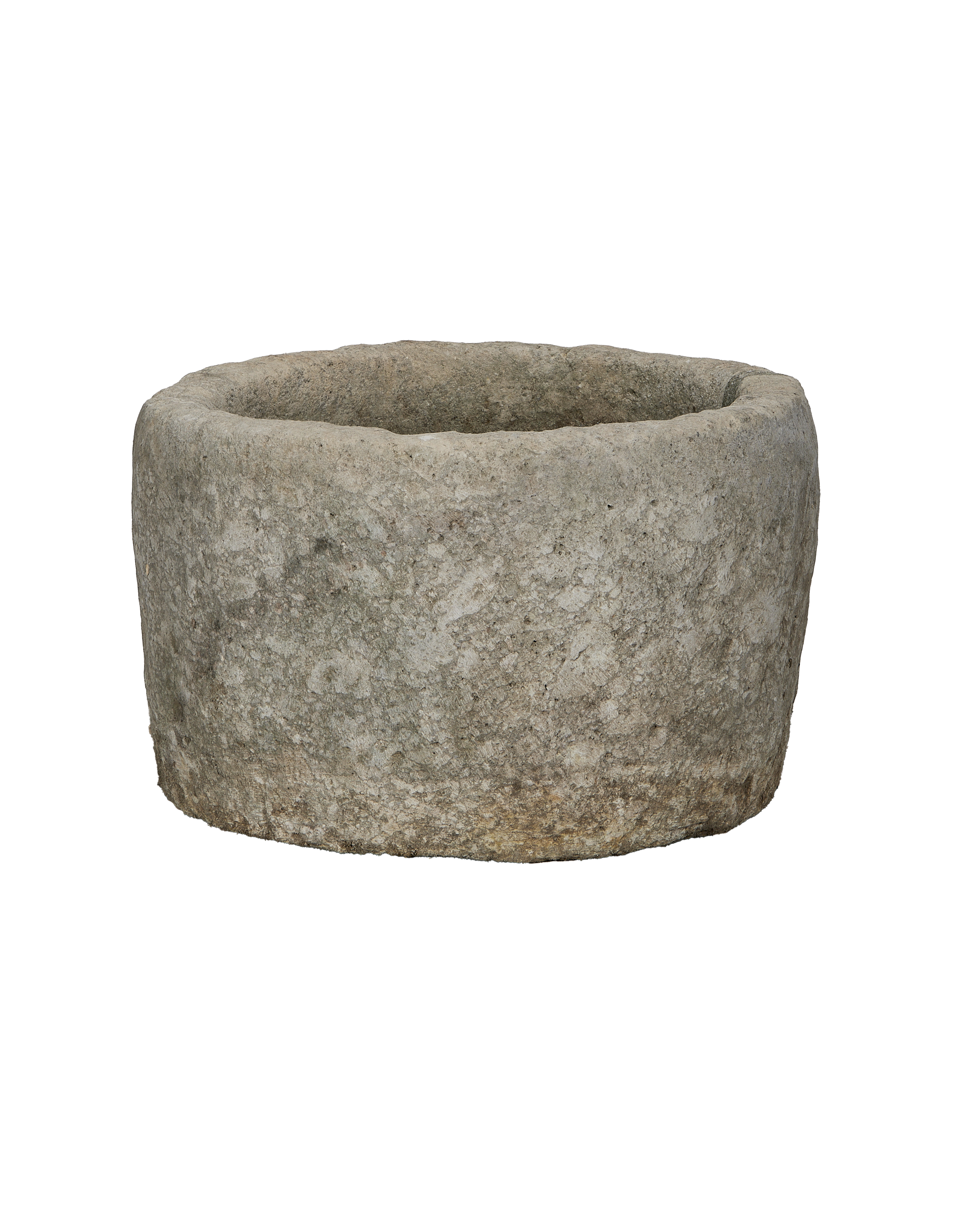 Vintage Indonesian round limestone trough, showing weathered texture and natural edge.