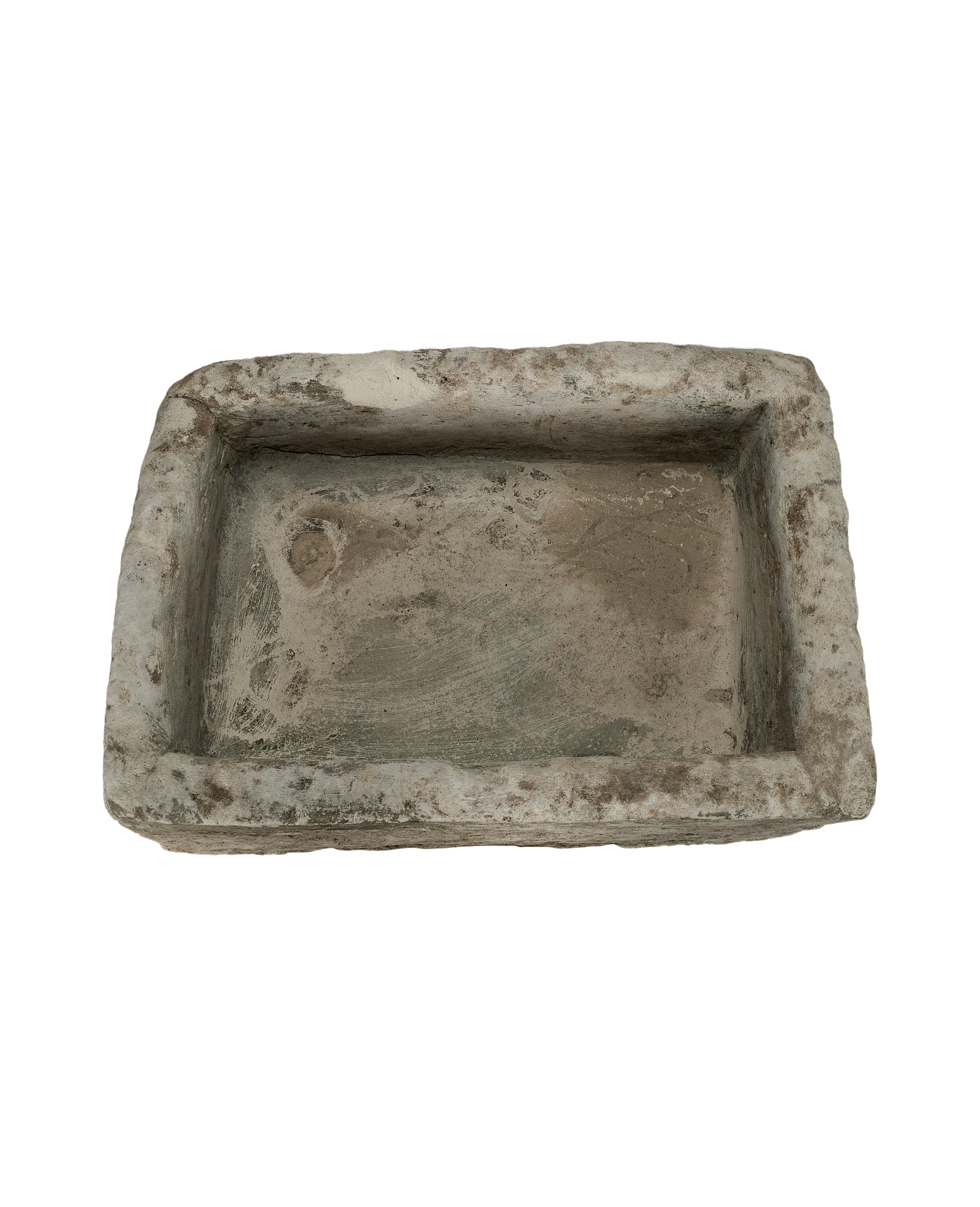Vintage Indonesian limestone trough, top view with visible weathered texture and rough edges.