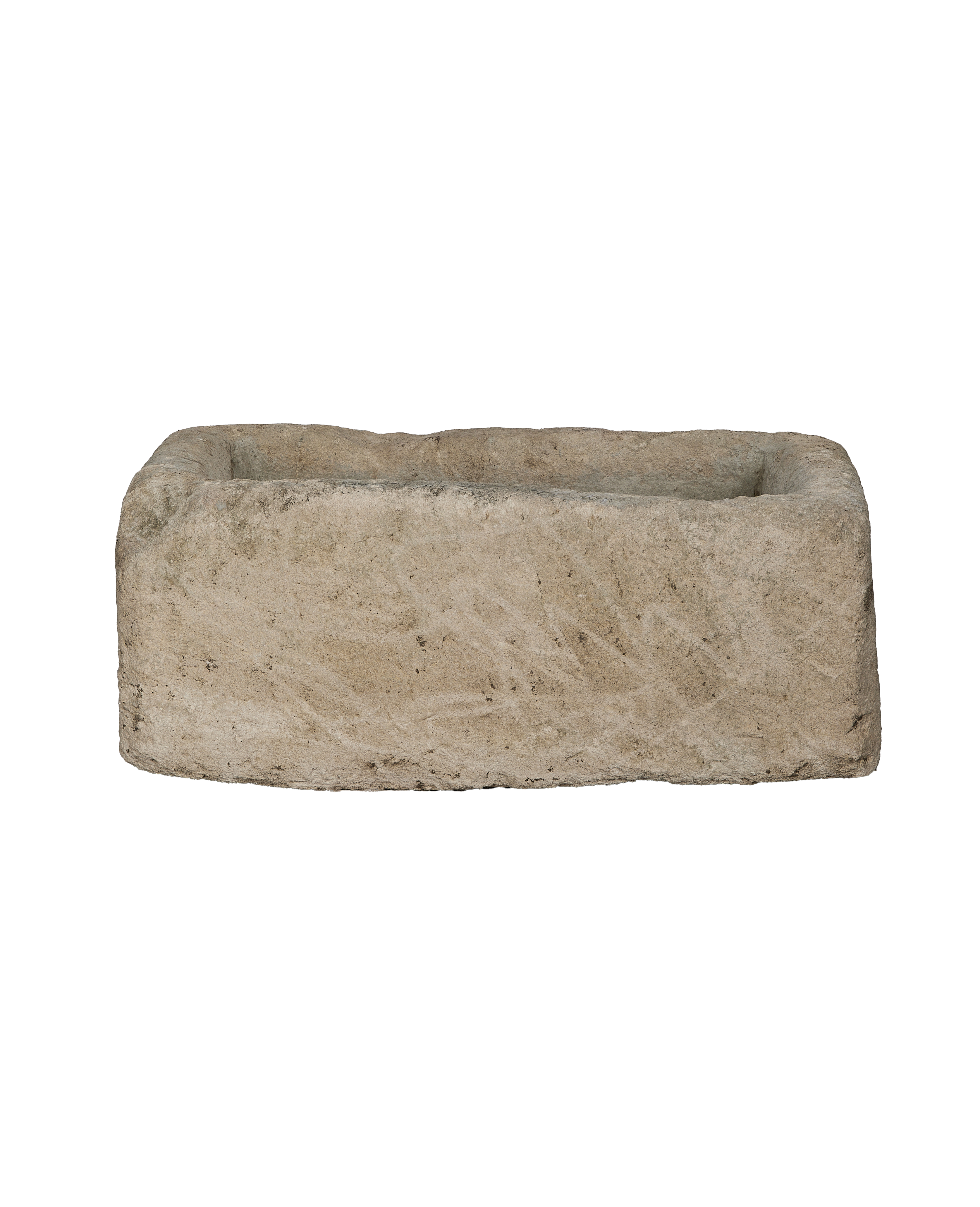 Vintage Indonesian rectangular limestone trough showing aged texture on its side.