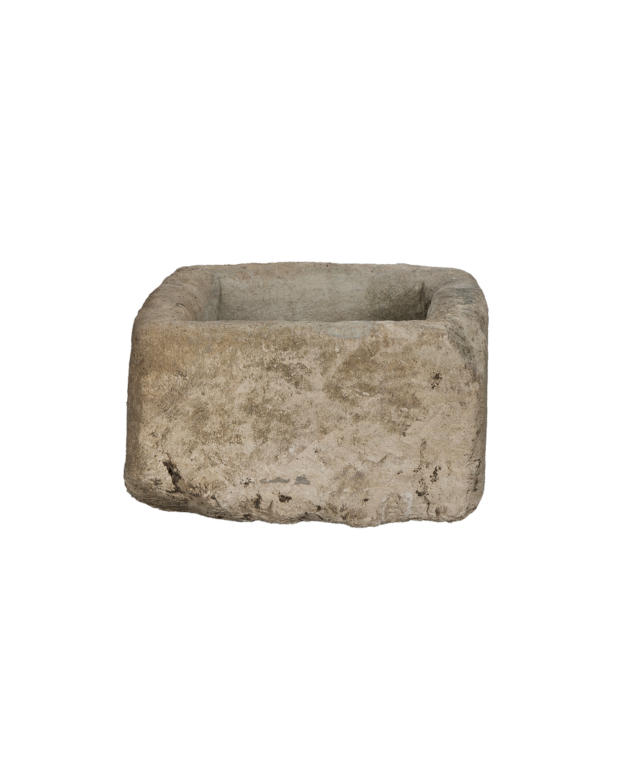 Vintage Indonesian rectangular limestone trough, front view highlighting aged, weathered texture.