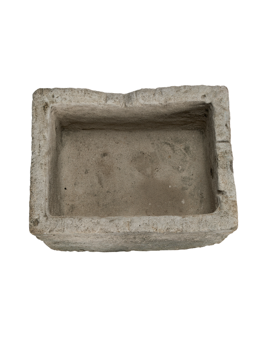 Vintage Indonesian limestone trough, top-down view highlighting the rectangular basin and weathered texture.