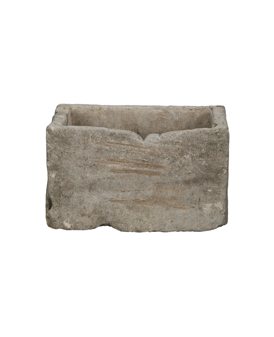 Vintage Indonesian limestone trough, rectangular, rough textured surface with slight indentation on front edge.