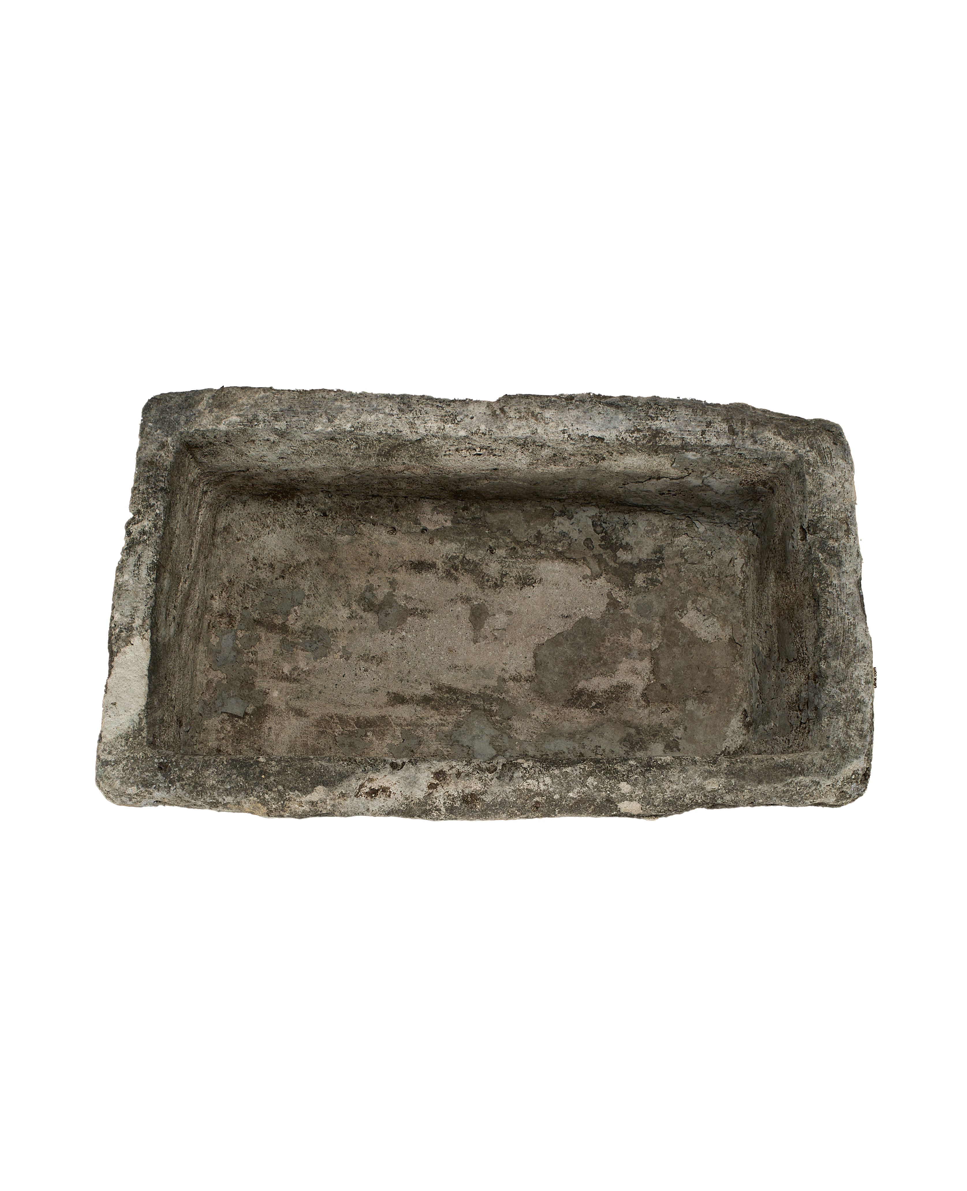 Vintage Indonesian limestone trough, top view revealing rough, weathered interior surface and rectangular shape.
