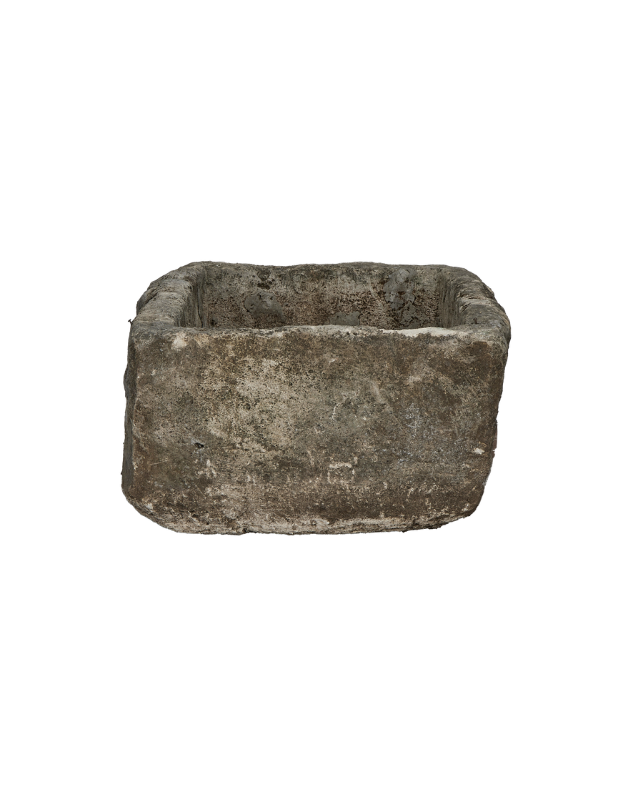 Vintage limestone trough from Indonesia, weathered with distinctive textural variations, viewed from above.